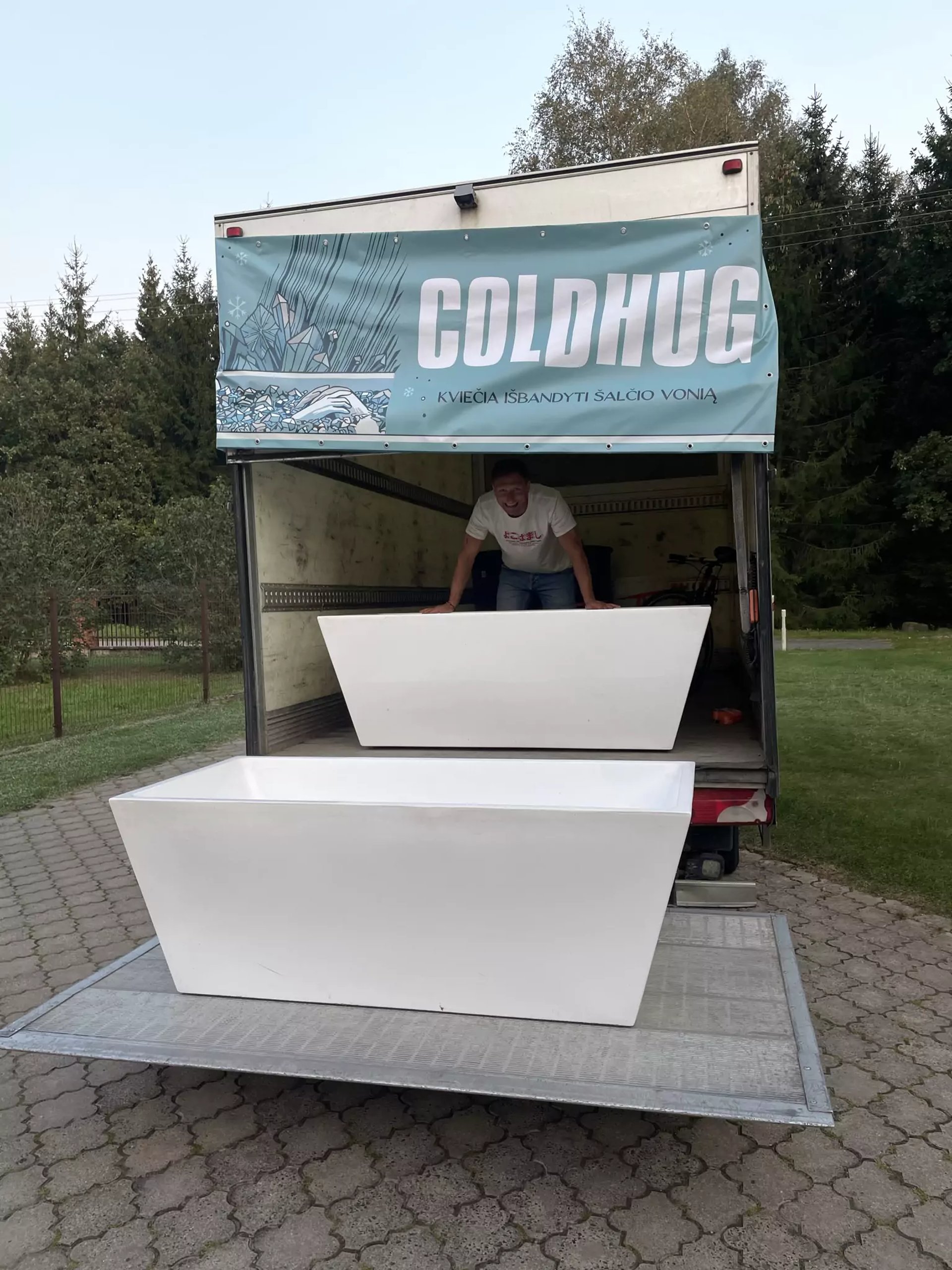 an abstract photo of a curved building with a blue sky in the background