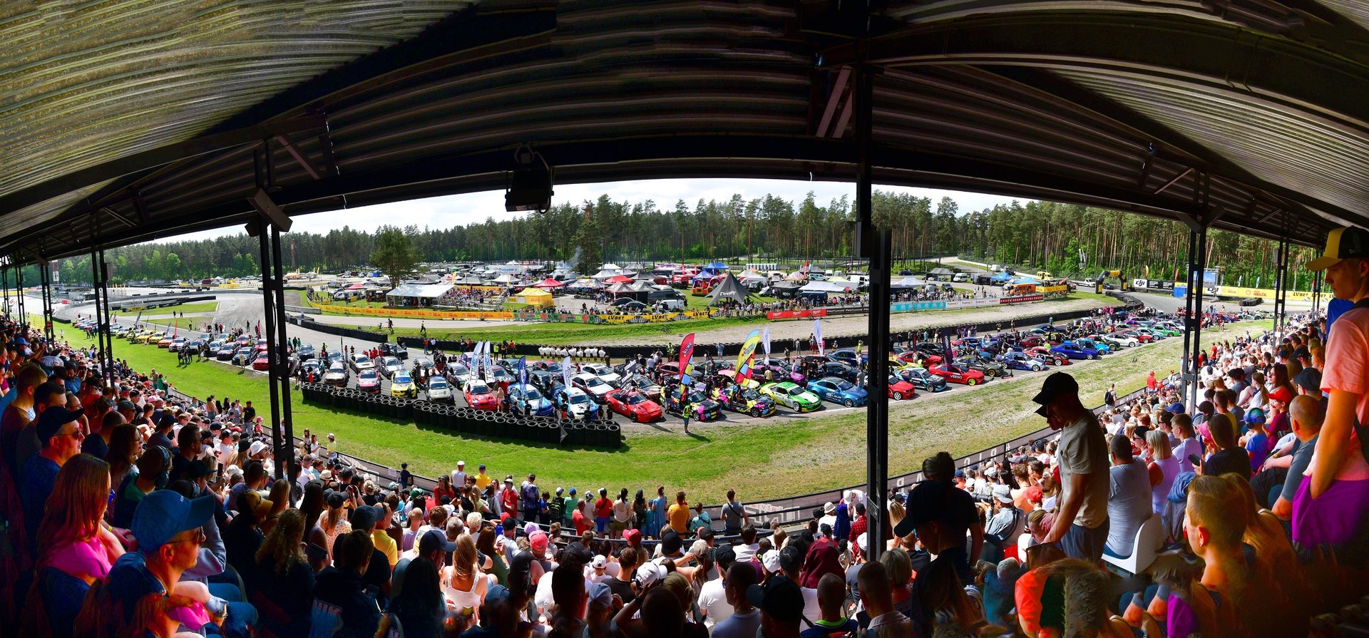 an abstract photo of a curved building with a blue sky in the background
