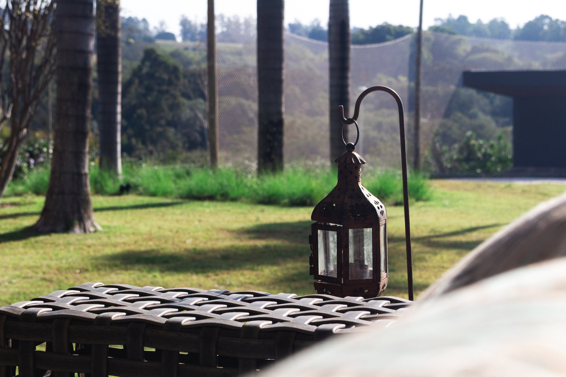 an abstract photo of a curved building with a blue sky in the background