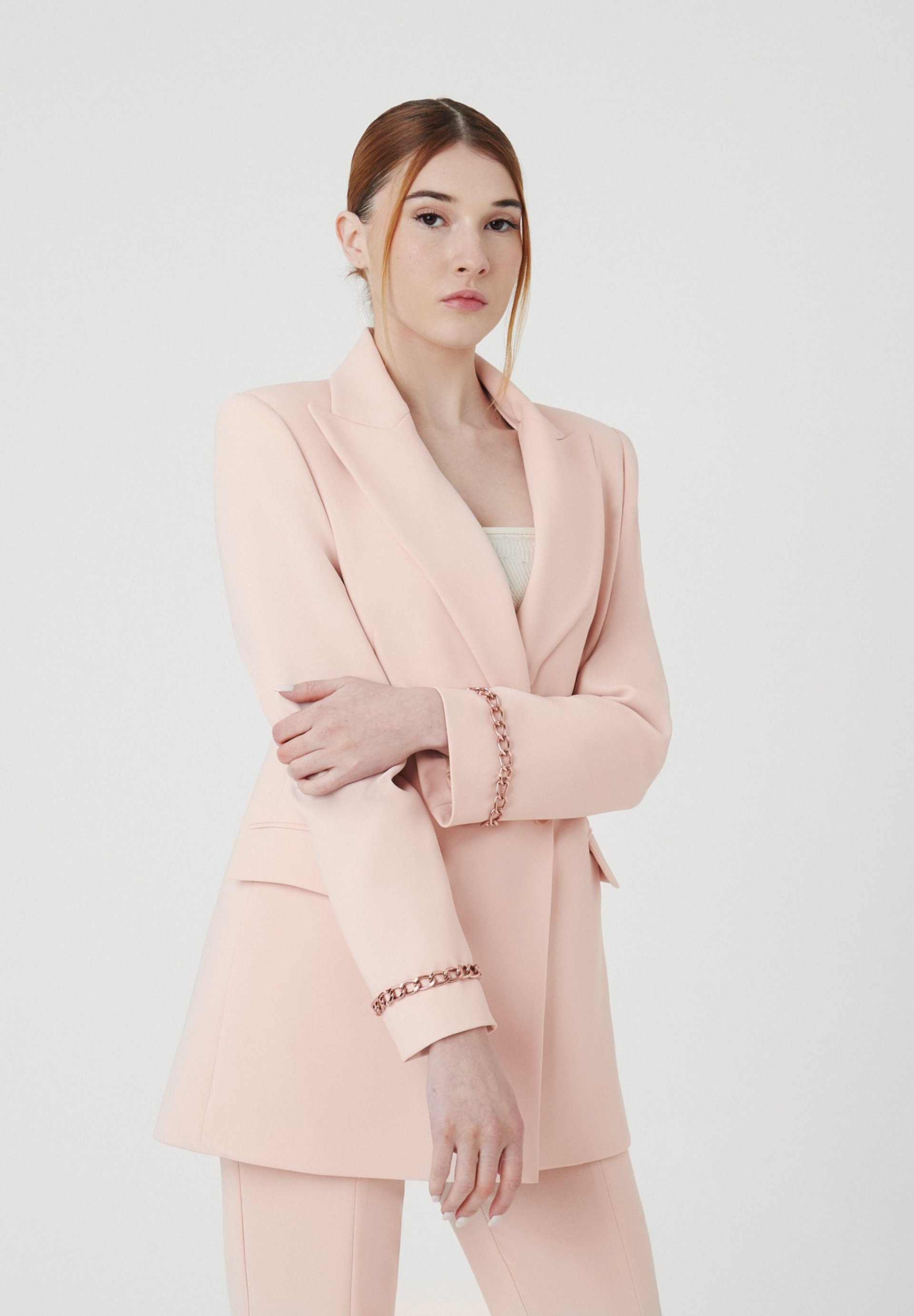 an abstract photo of a curved building with a blue sky in the background