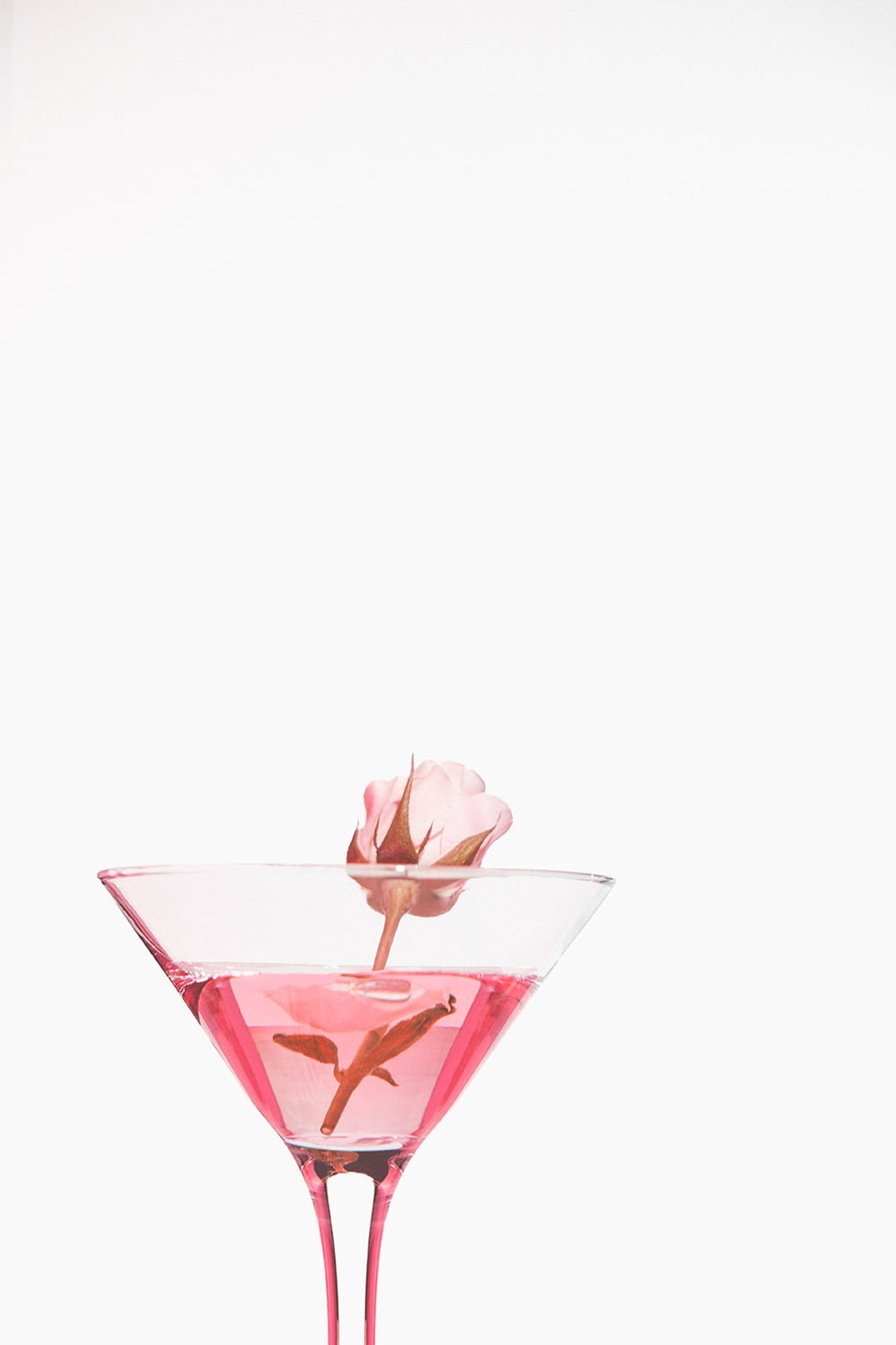 an abstract photo of a curved building with a blue sky in the background