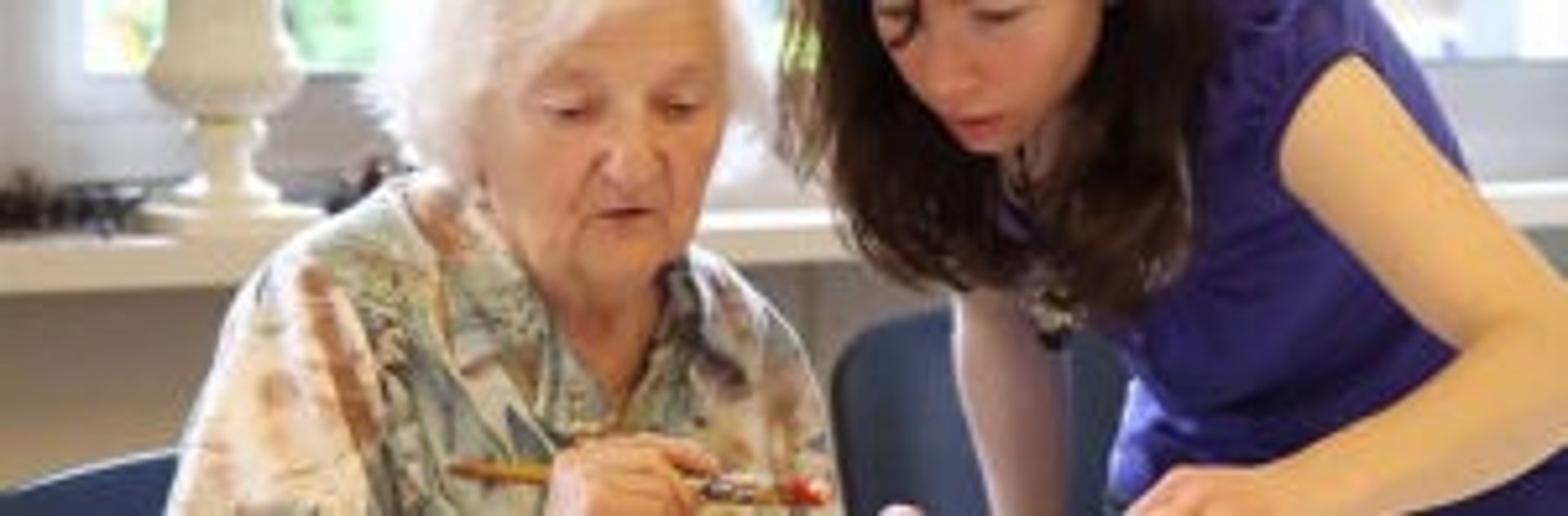 woman wearing yellow long-sleeved dress under white clouds and blue sky during daytime