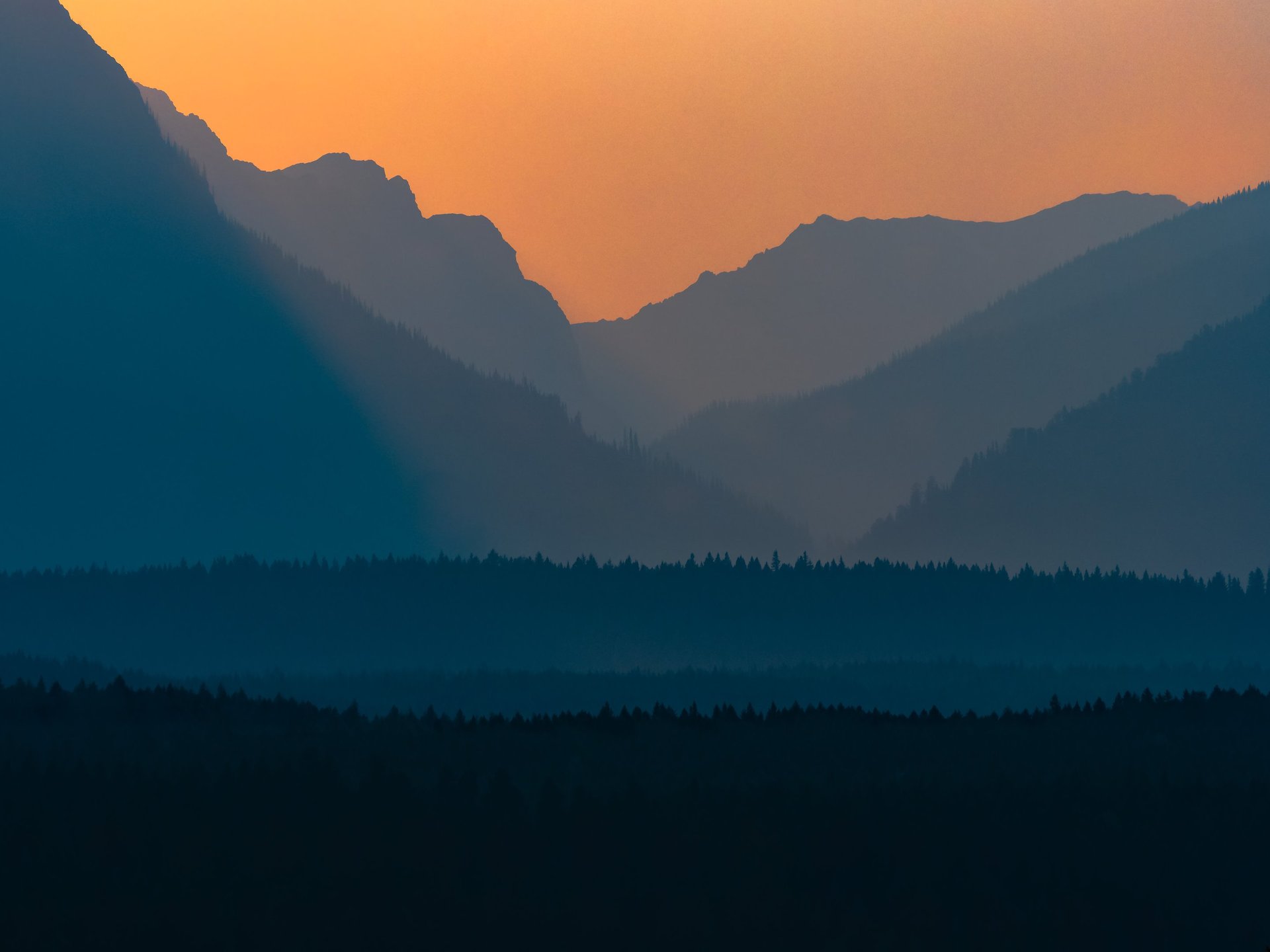 mountain range under blue sky