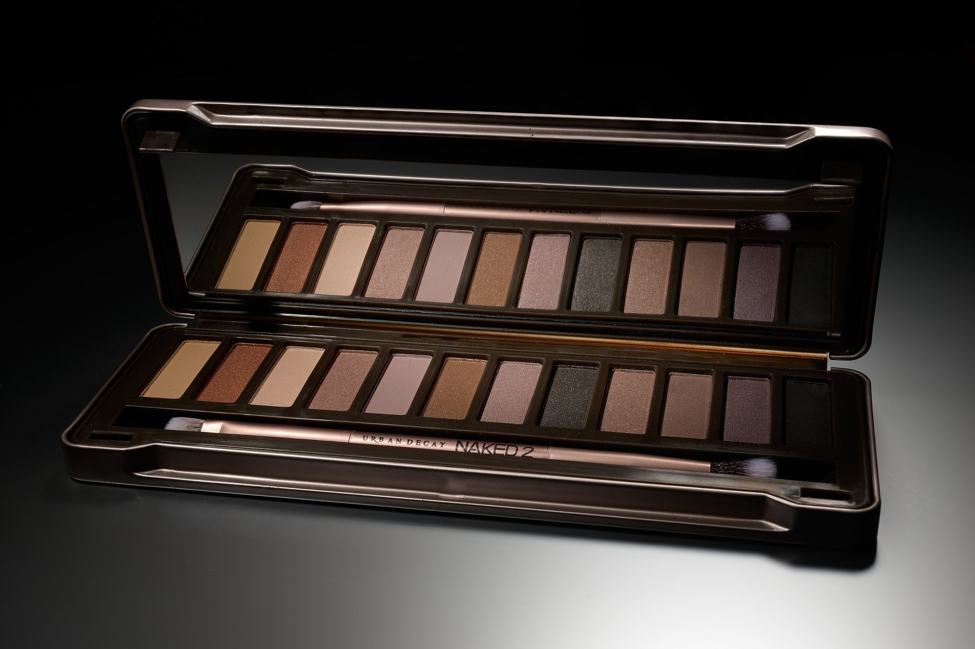 an abstract photo of a curved building with a blue sky in the background