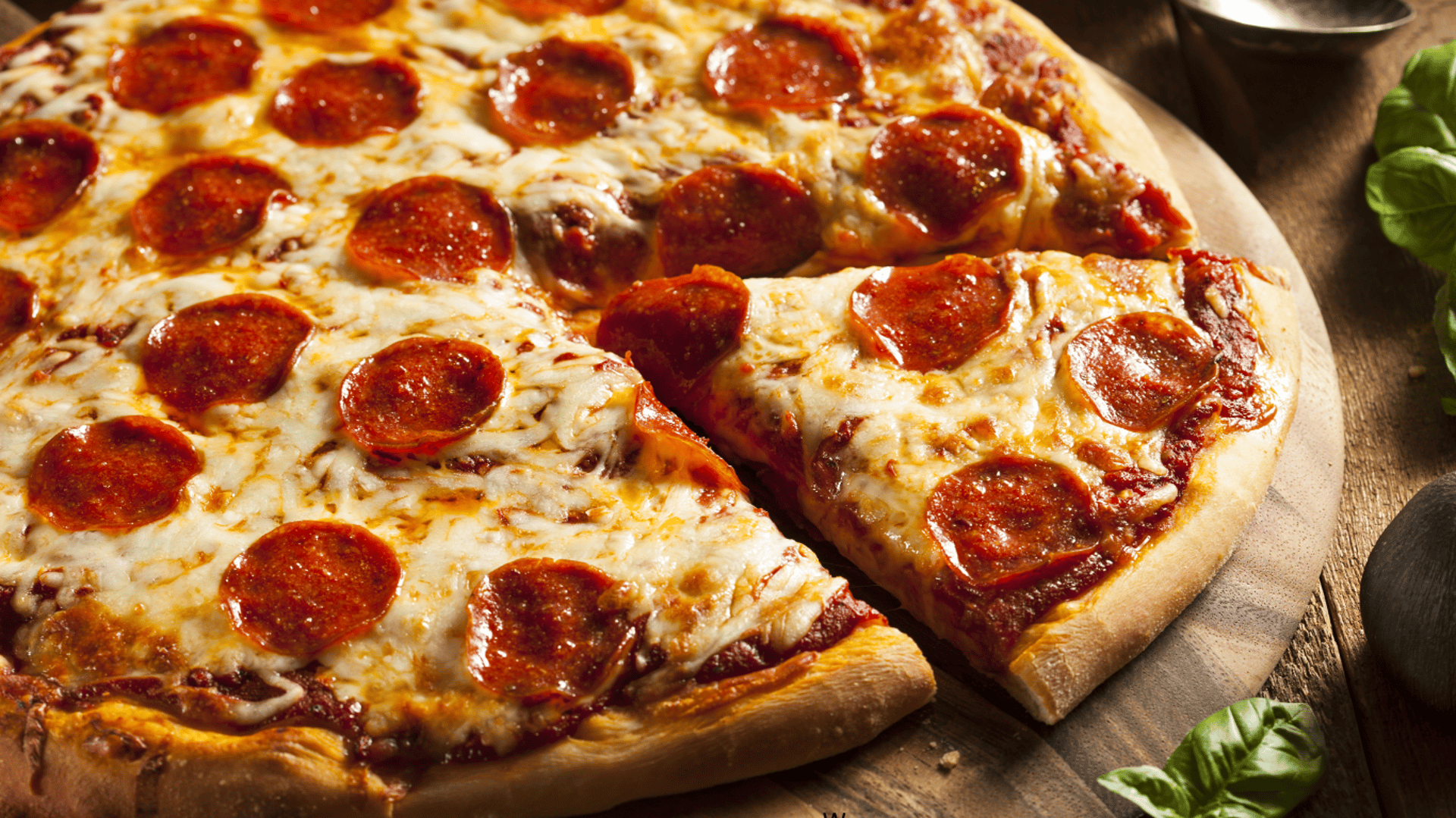 pizza on chopping board
