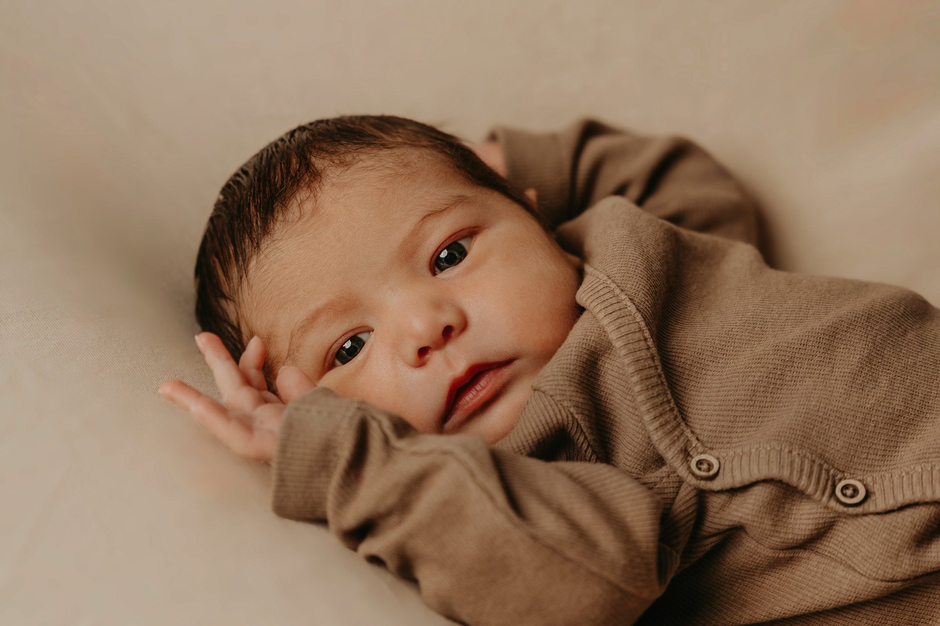 an abstract photo of a curved building with a blue sky in the background