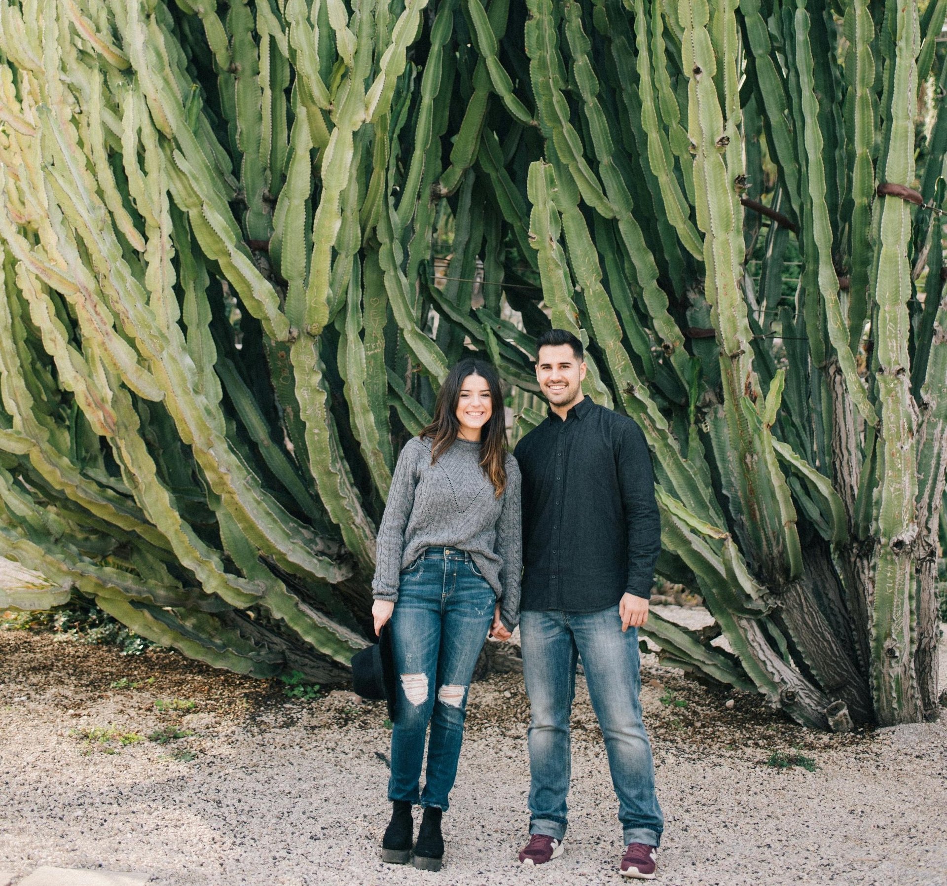 couple wearing silver-colored rings