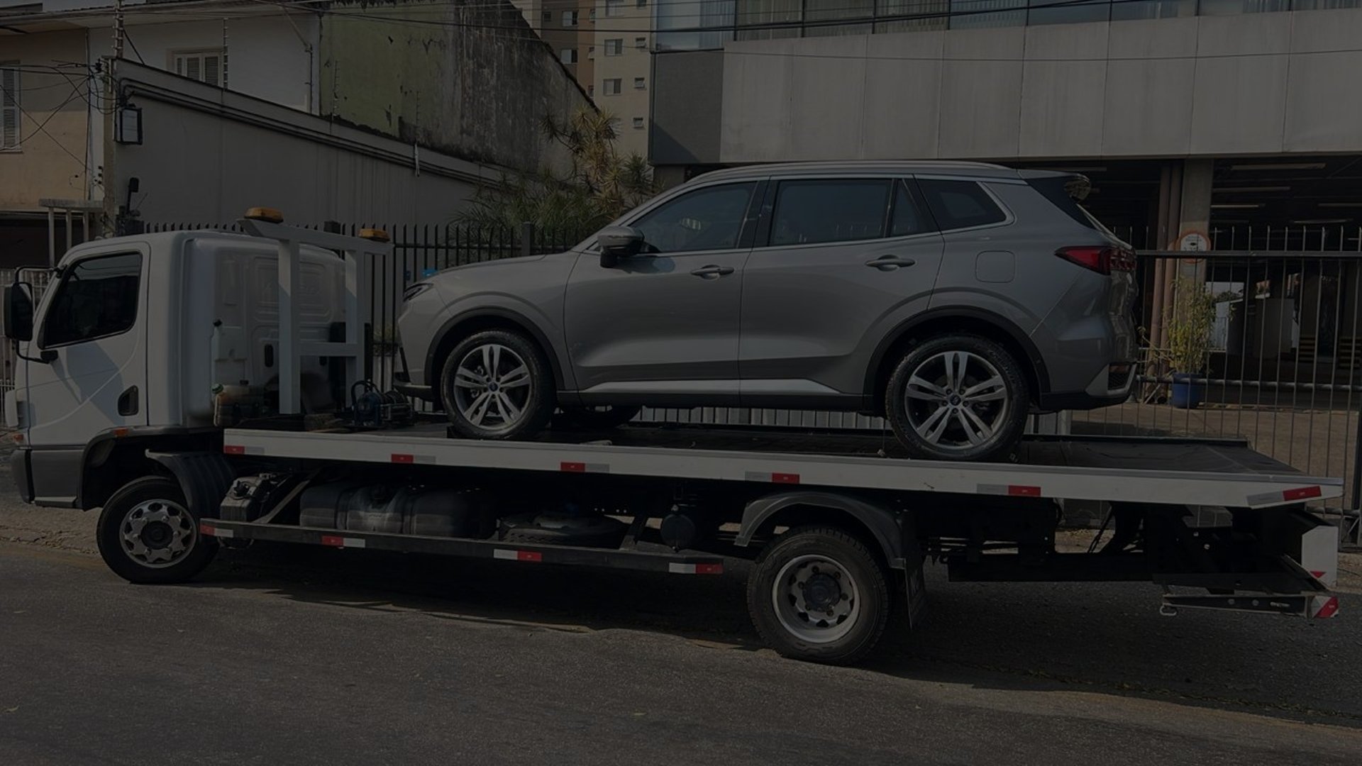 black and brown leather padded tub sofa