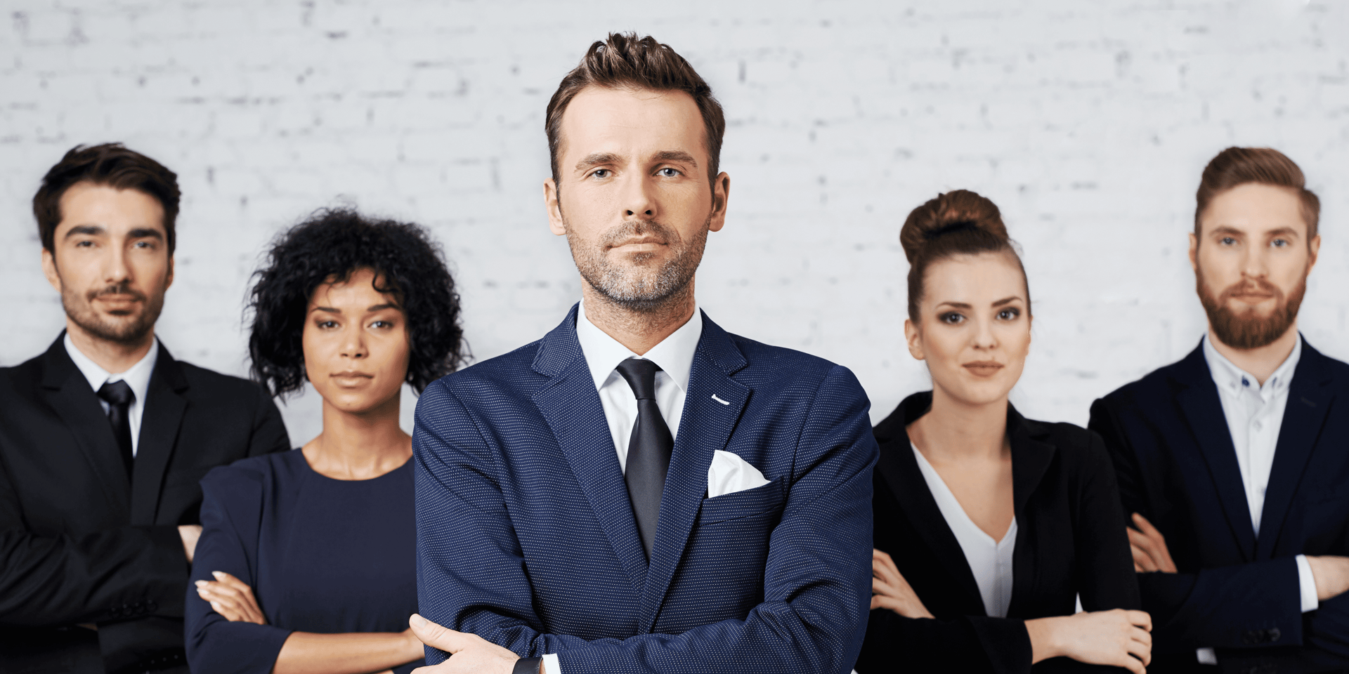 A group of people standing next to each other