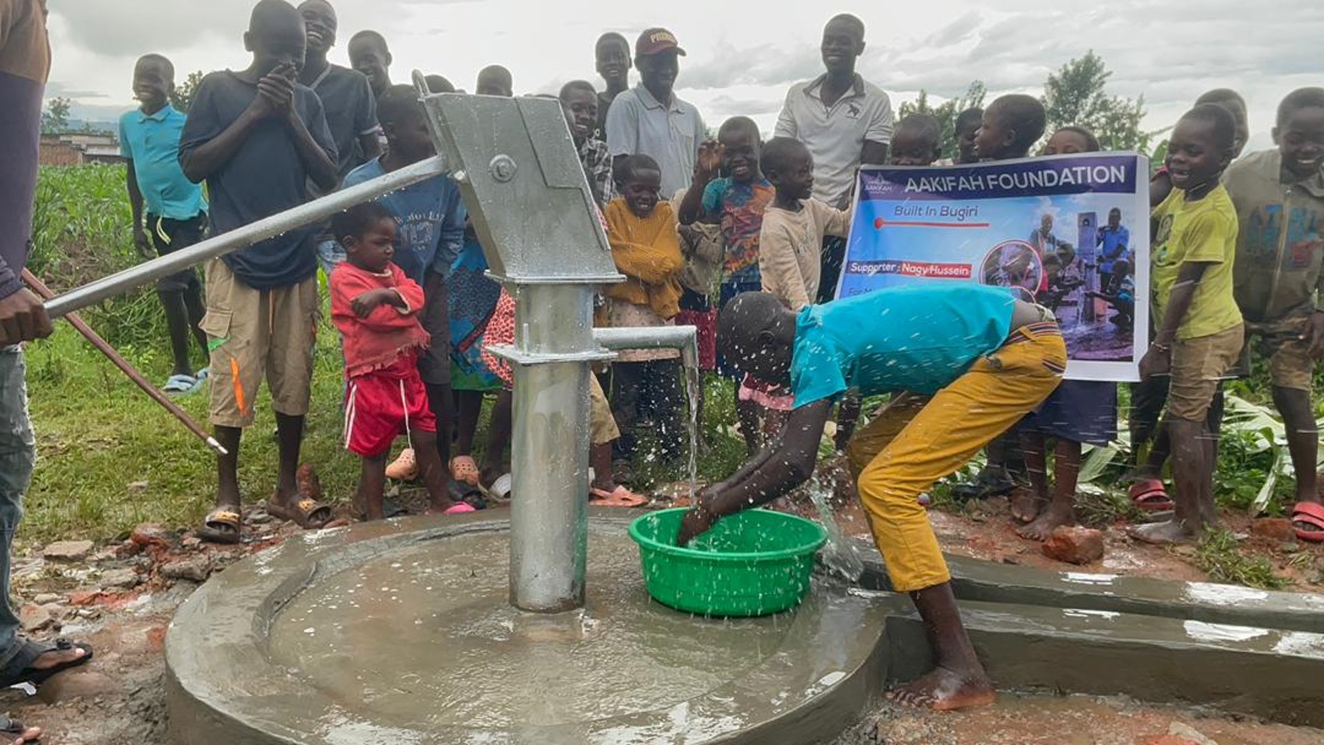 woman wearing yellow long-sleeved dress under white clouds and blue sky during daytime