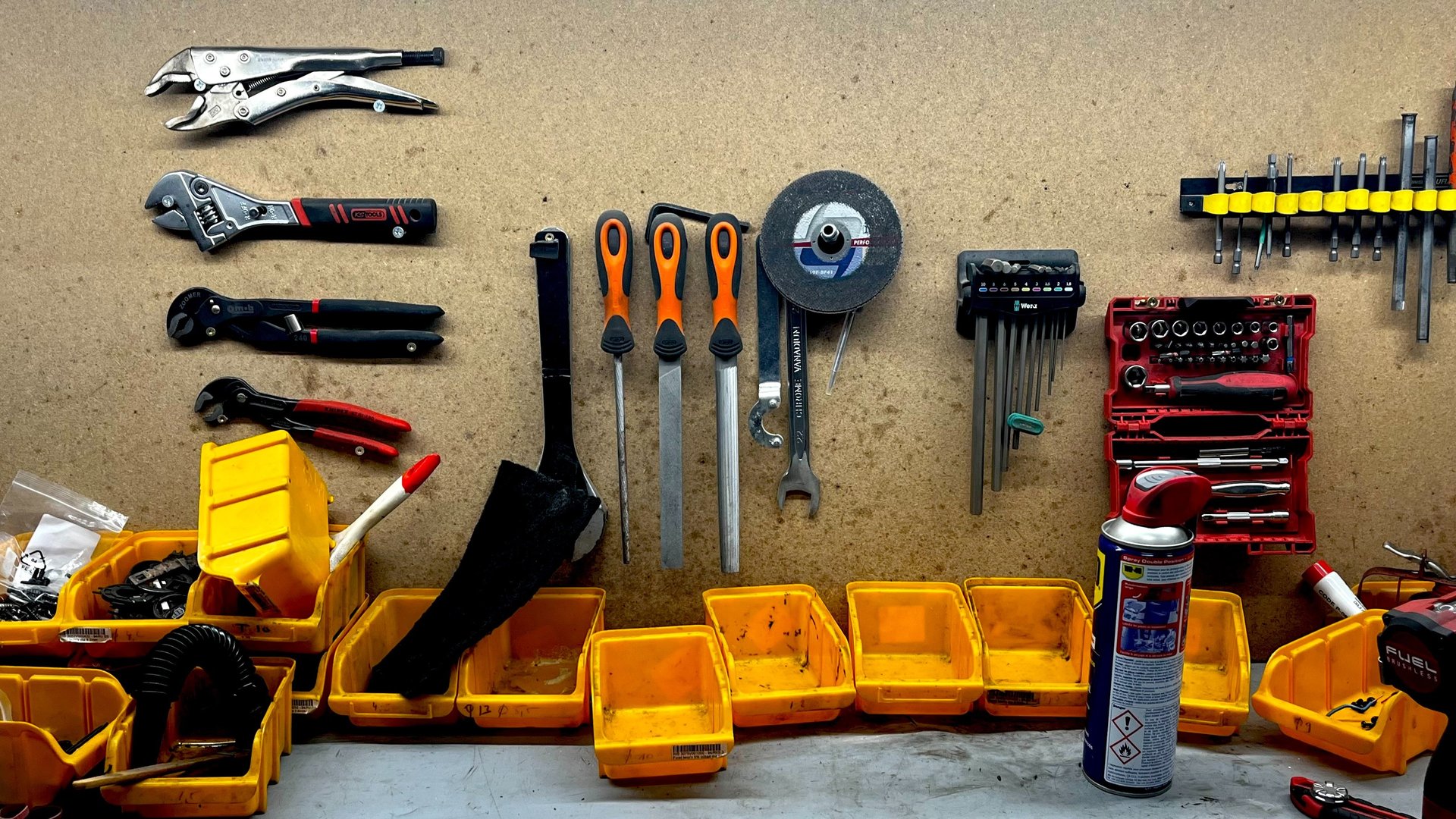 an abstract photo of a curved building with a blue sky in the background
