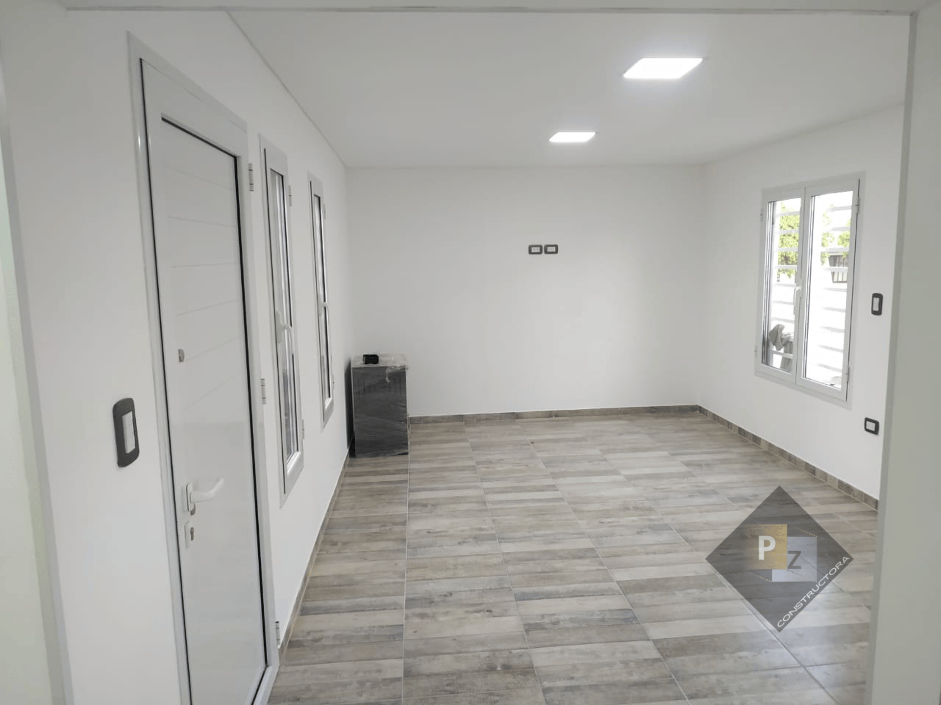 black and brown leather padded tub sofa
