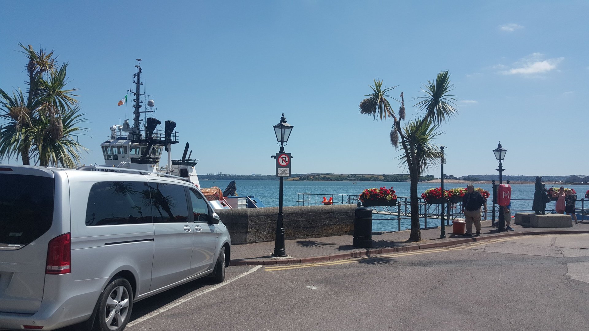 woman wearing yellow long-sleeved dress under white clouds and blue sky during daytime