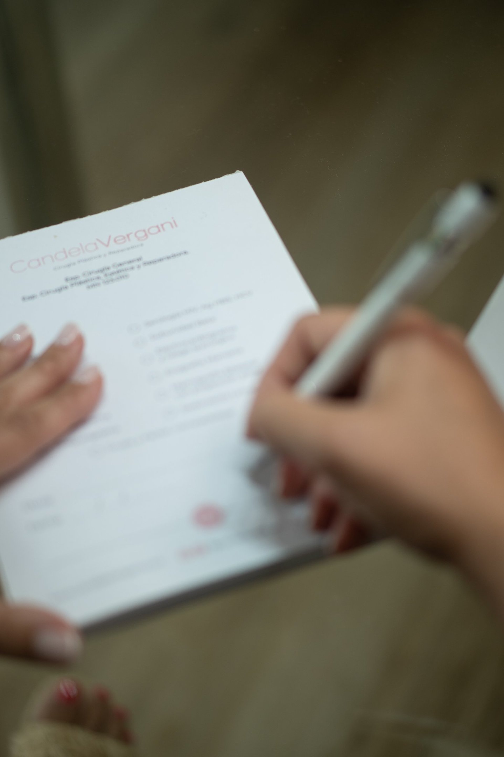 an abstract photo of a curved building with a blue sky in the background