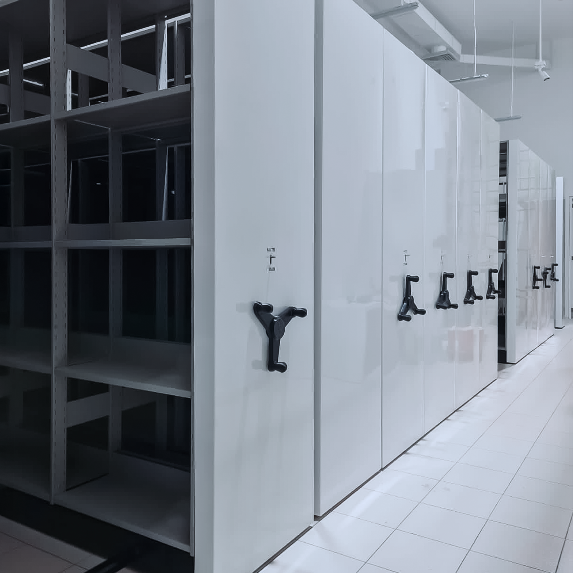 an abstract photo of a curved building with a blue sky in the background
