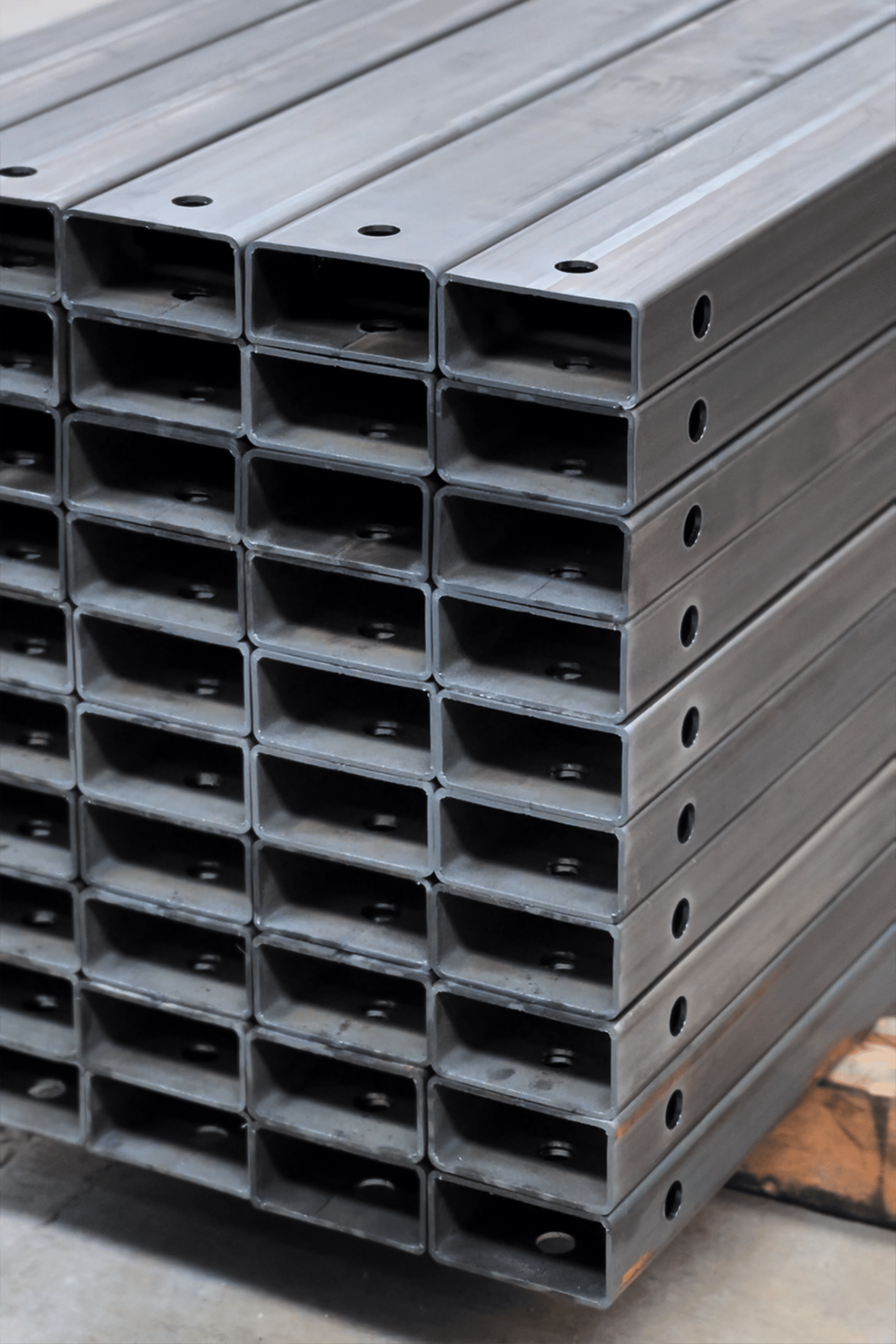an abstract photo of a curved building with a blue sky in the background