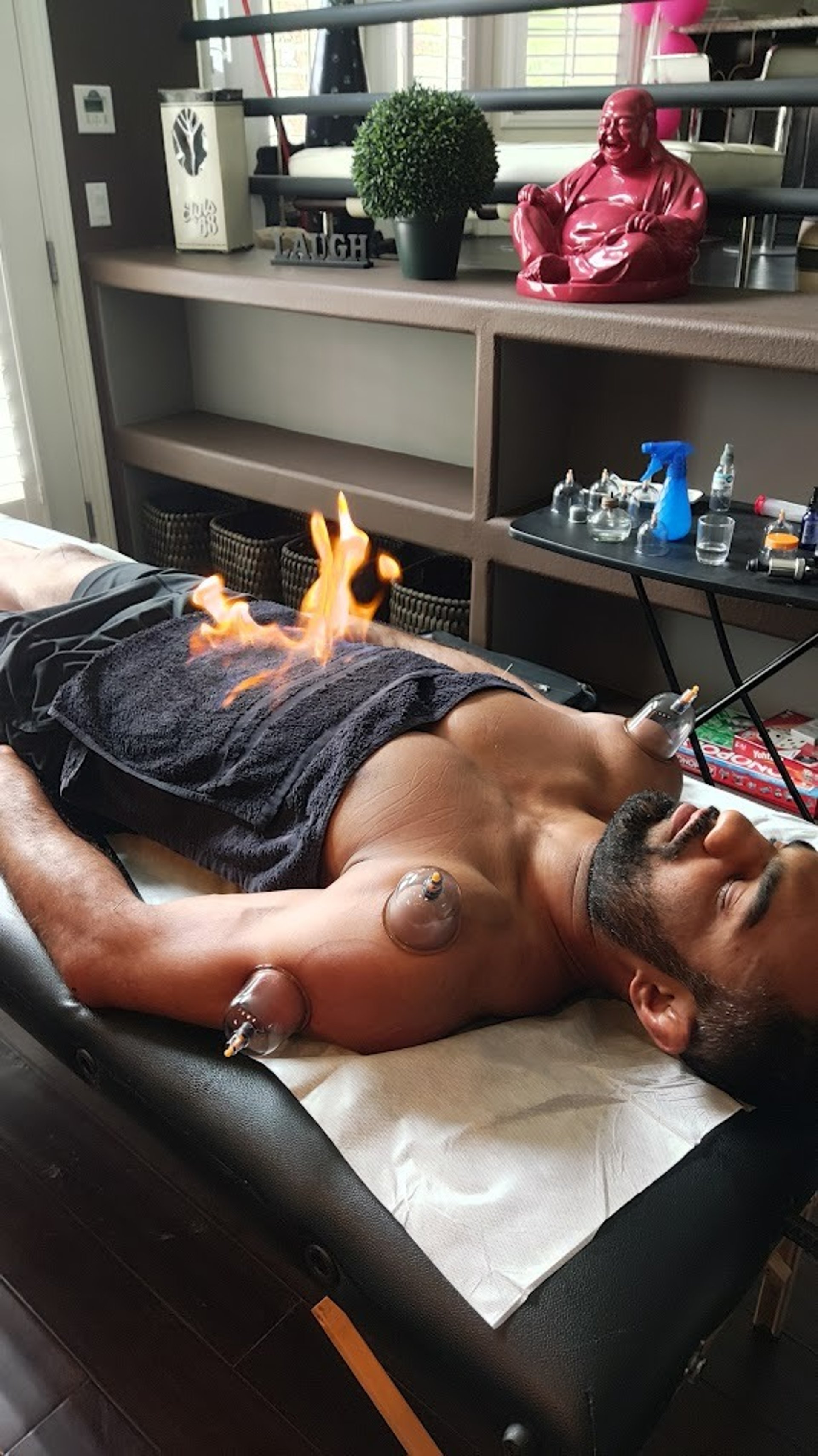 black and brown leather padded tub sofa