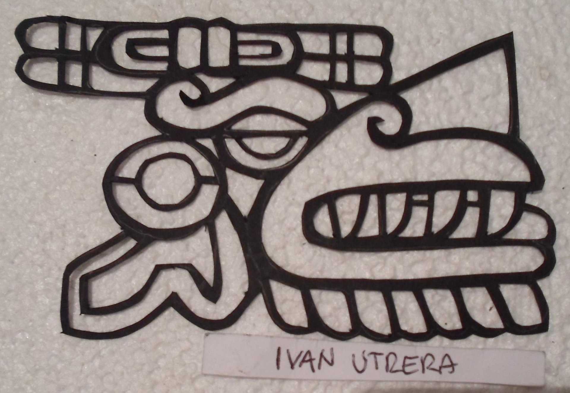 an abstract photo of a curved building with a blue sky in the background