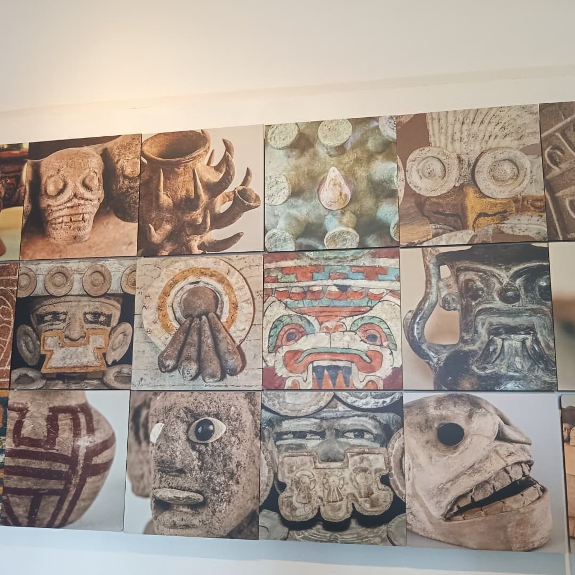 an abstract photo of a curved building with a blue sky in the background