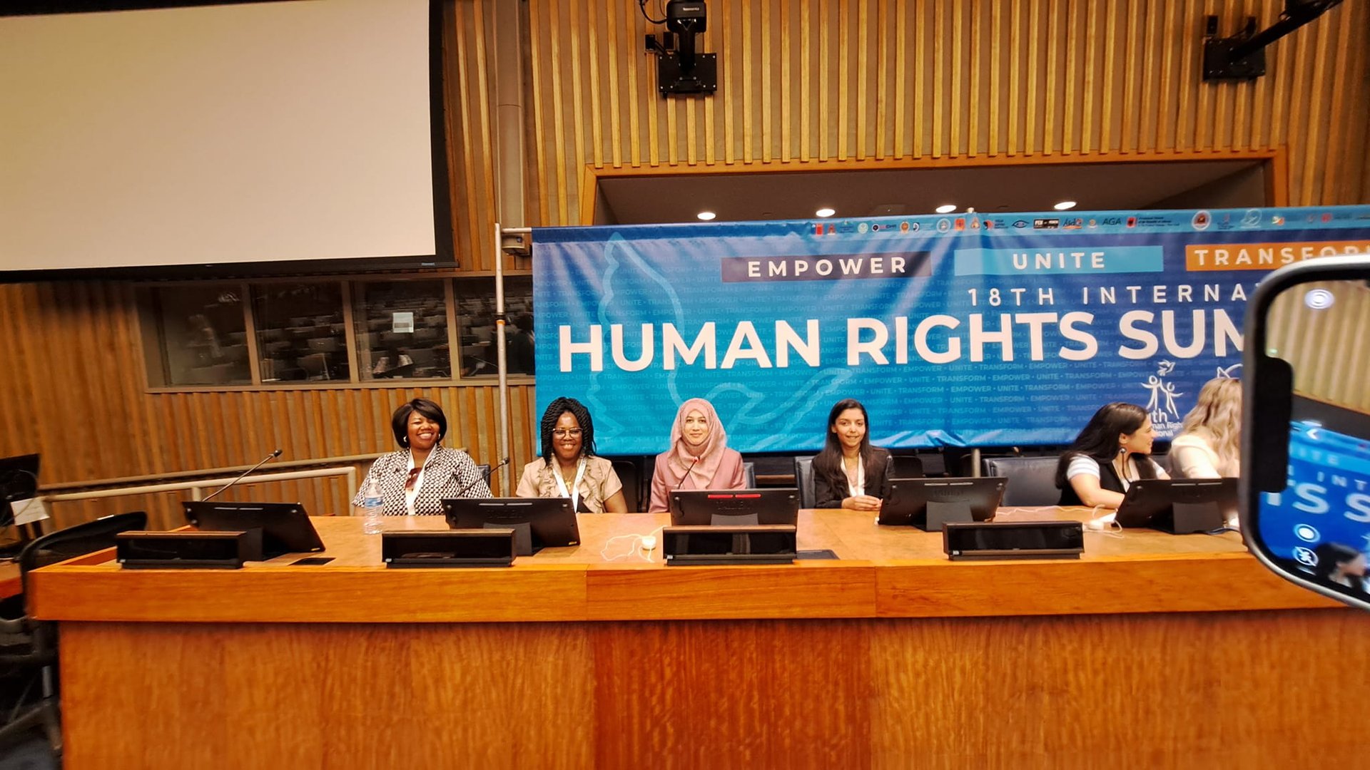 black and brown leather padded tub sofa