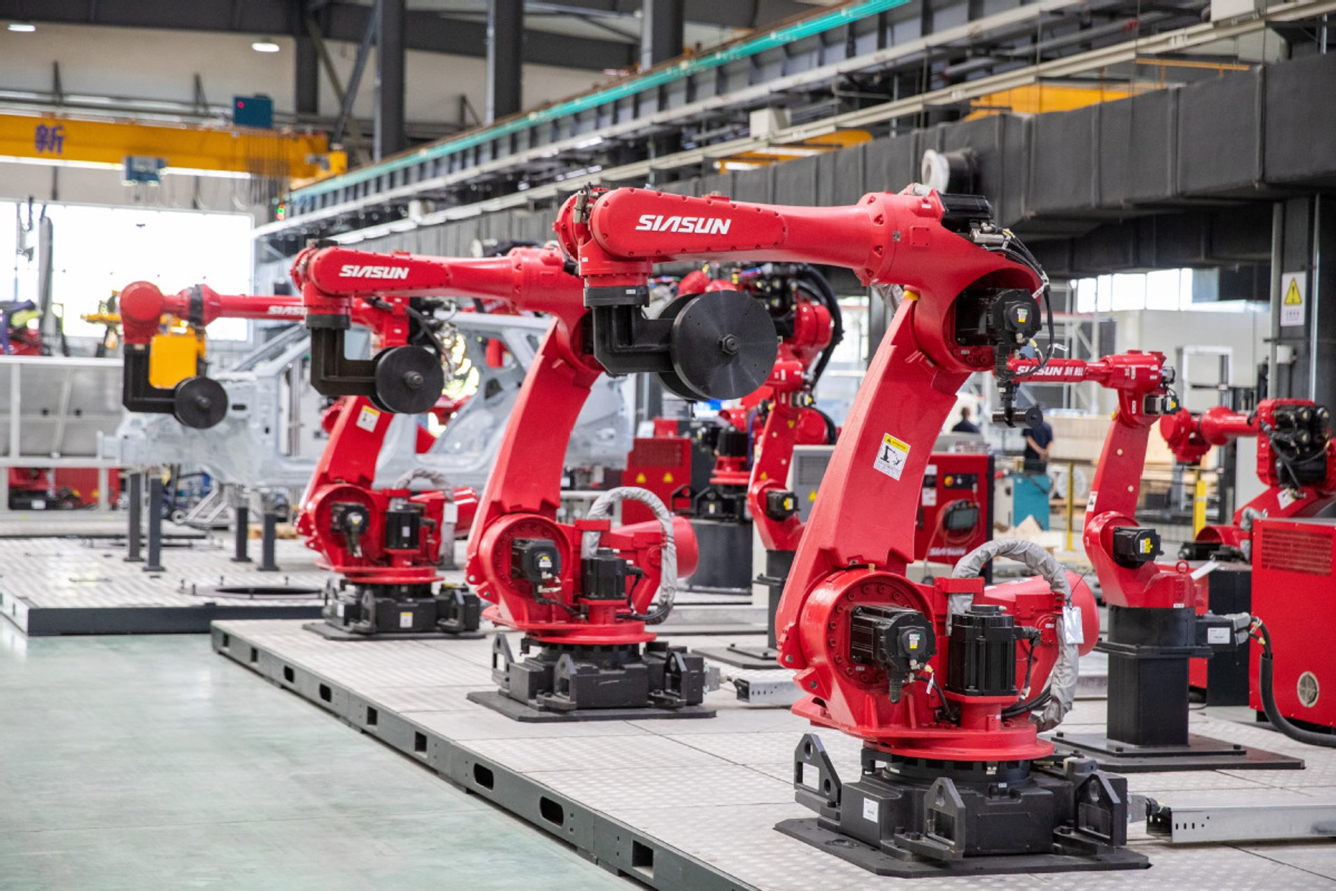 a piece of metal being cut with a machine