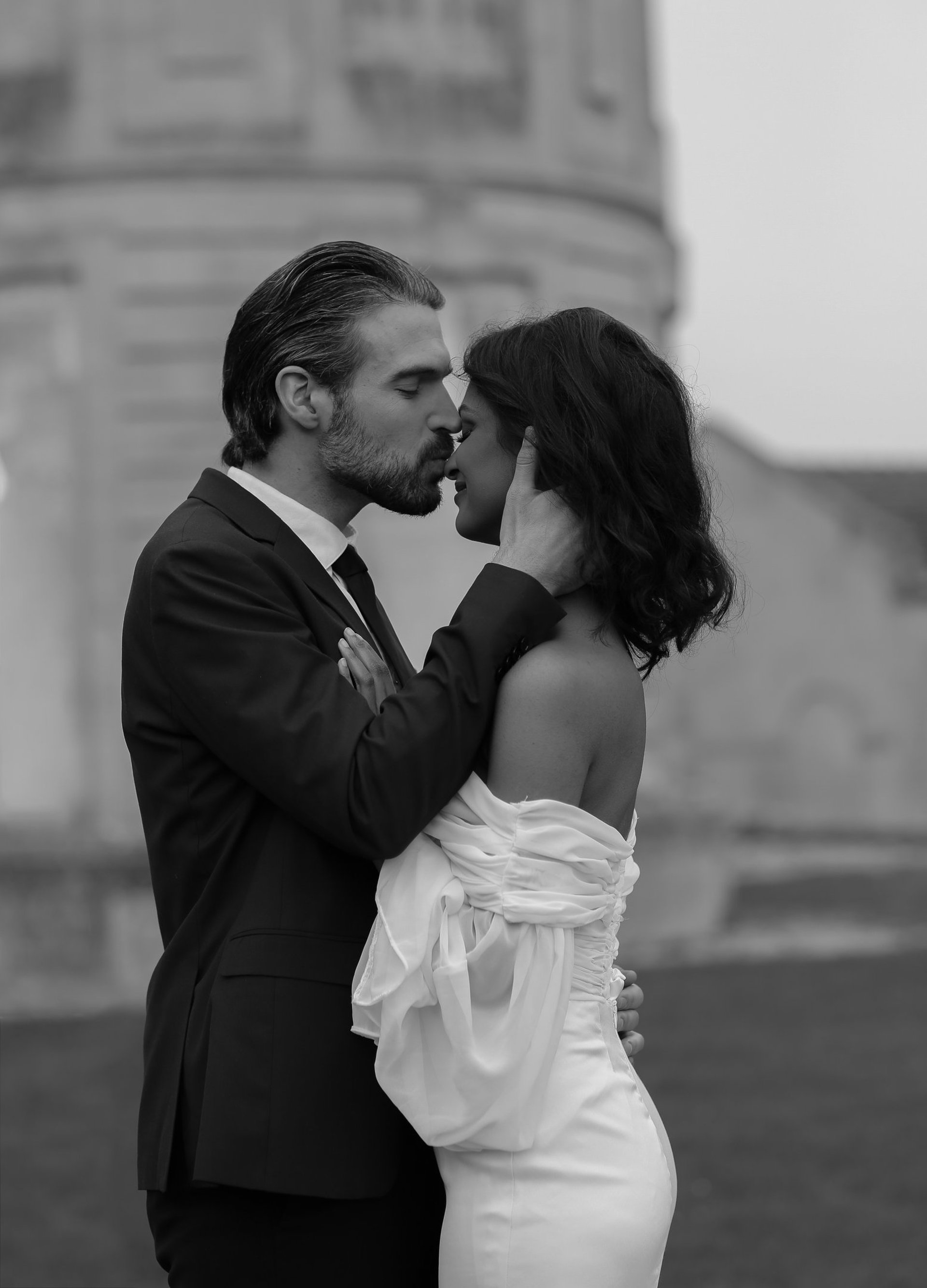an abstract photo of a curved building with a blue sky in the background
