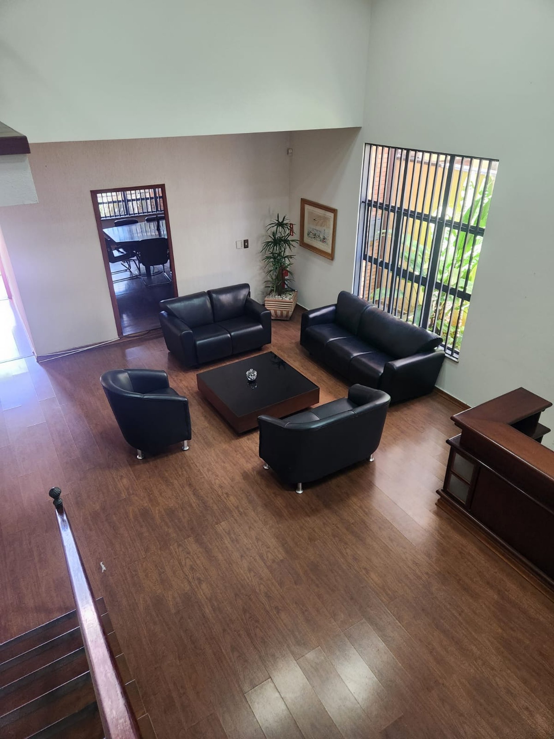 an abstract photo of a curved building with a blue sky in the background
