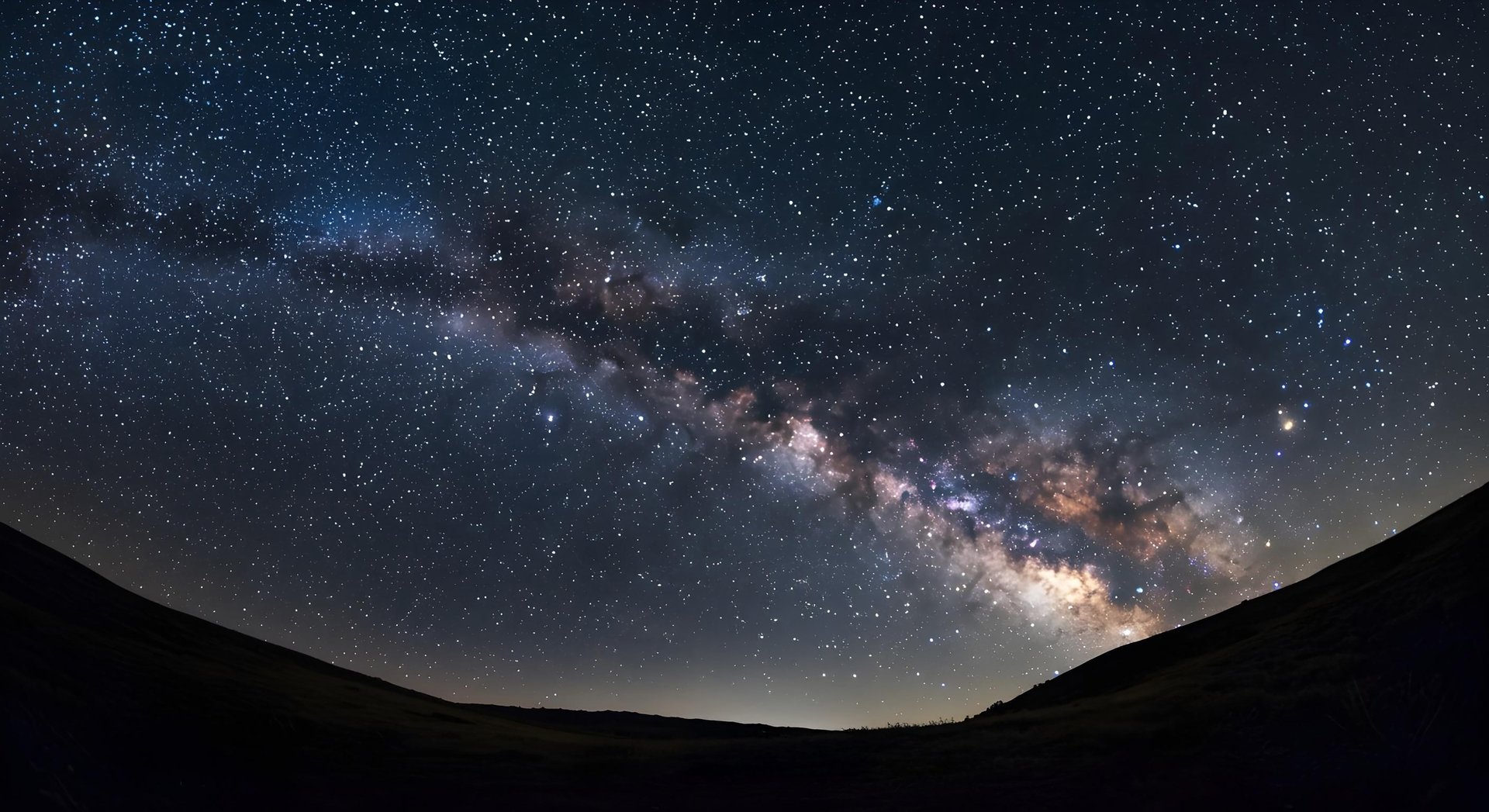 an abstract photo of a curved building with a blue sky in the background