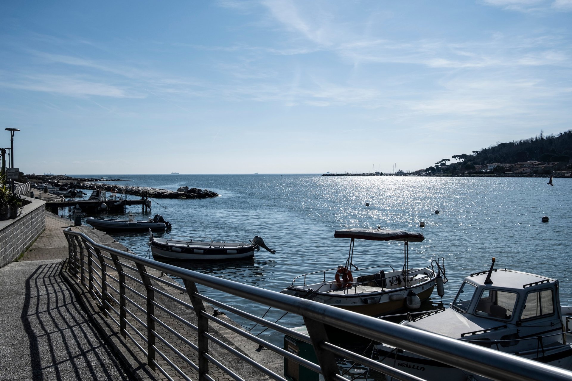 woman wearing yellow long-sleeved dress under white clouds and blue sky during daytime