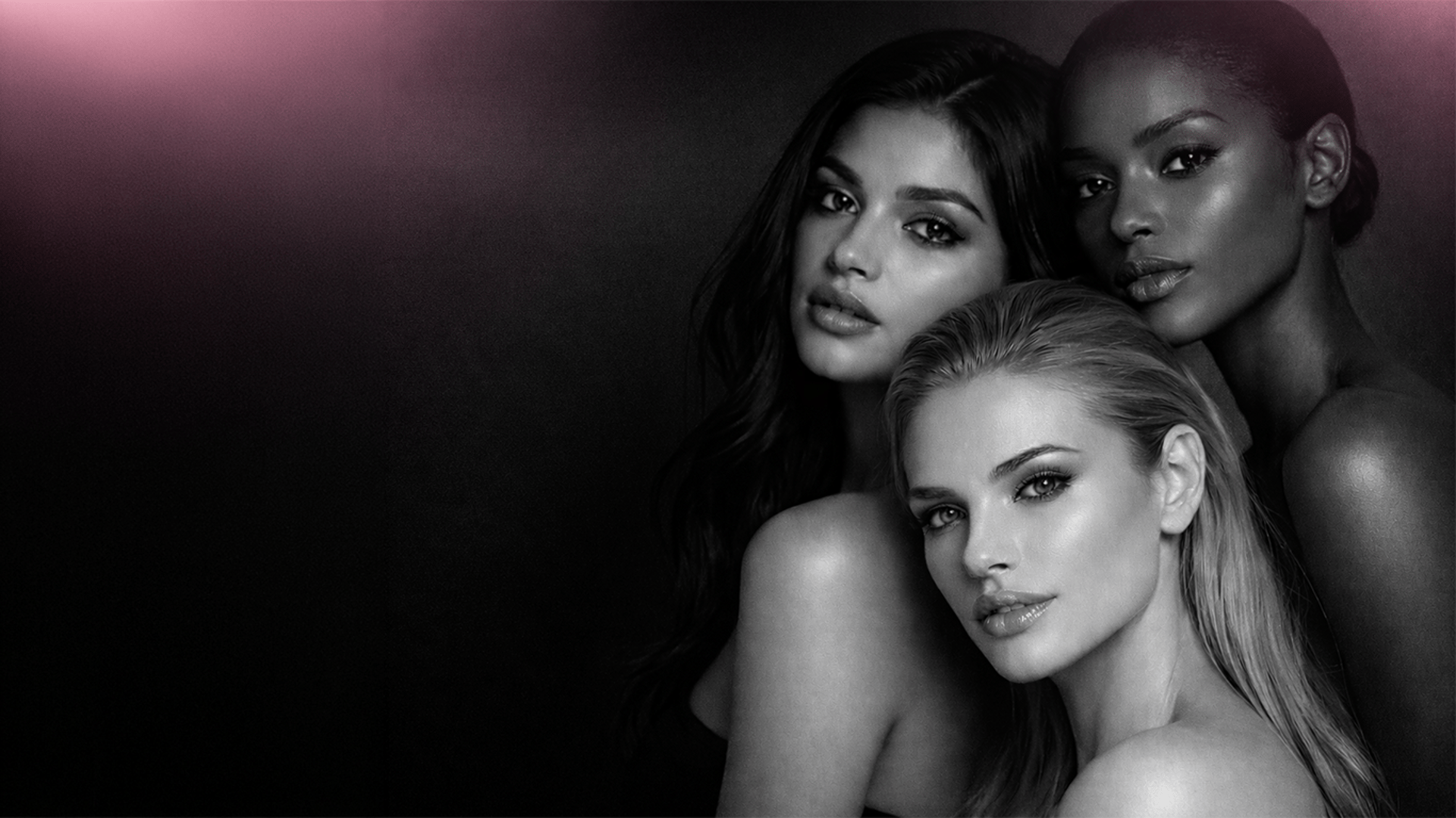 A pink car parked on the side of the road