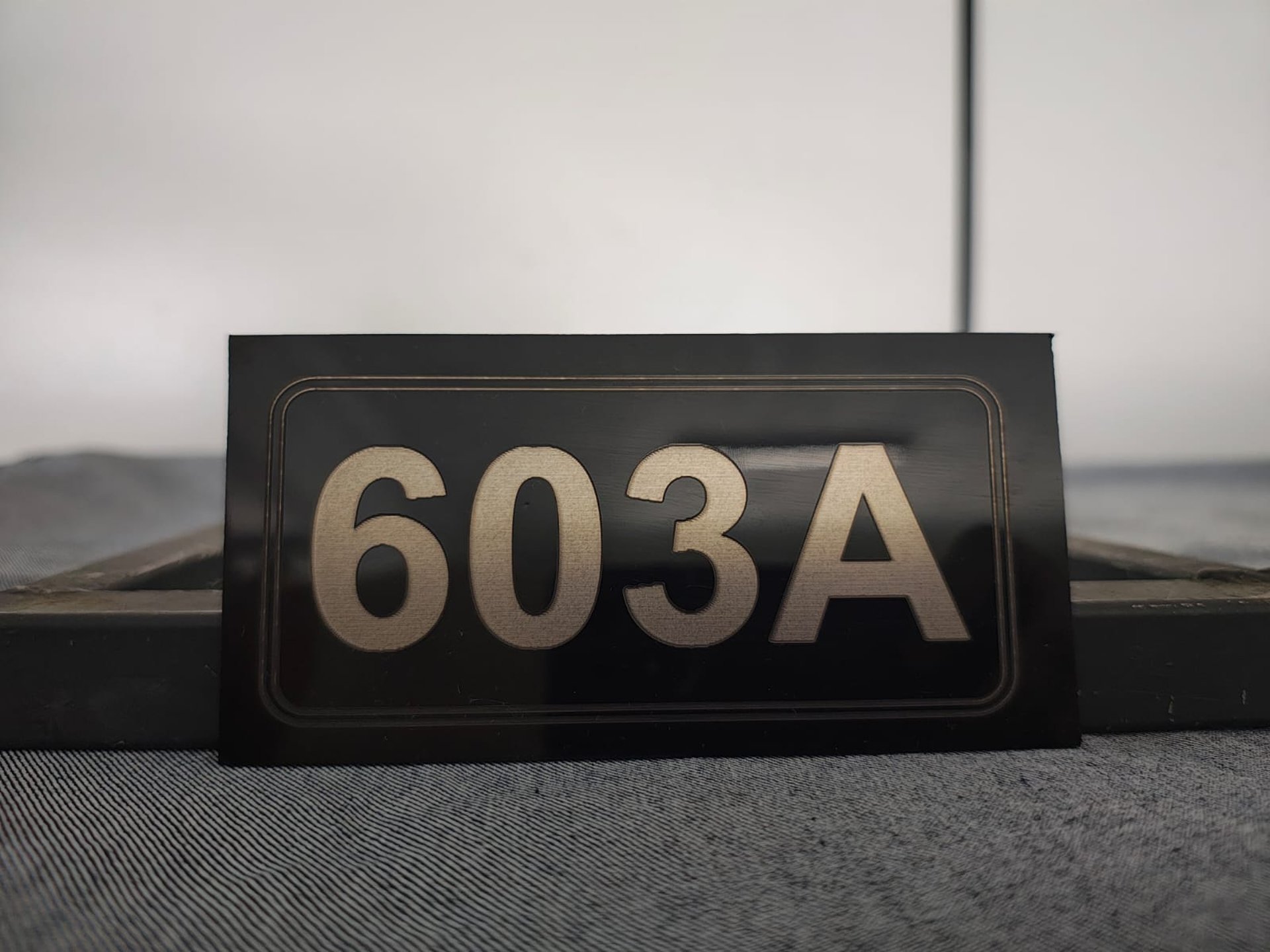 an abstract photo of a curved building with a blue sky in the background