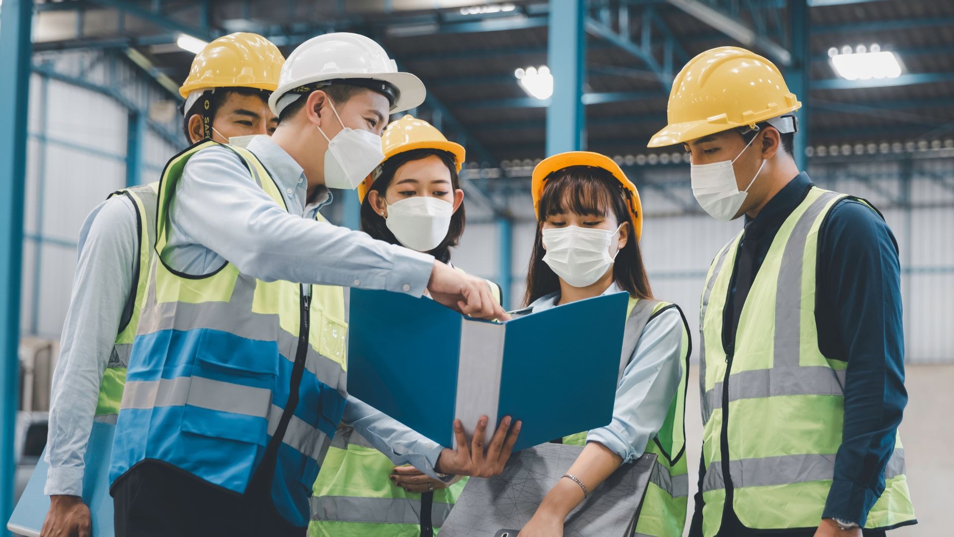 an abstract photo of a curved building with a blue sky in the background