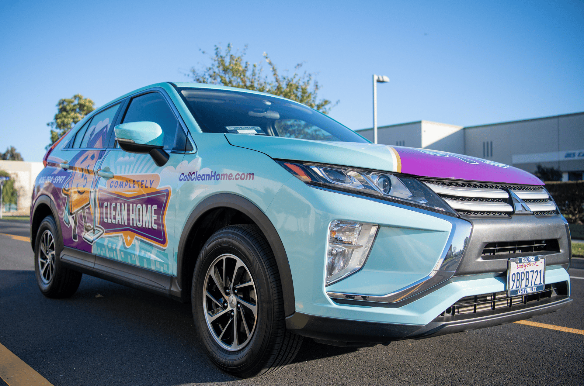 an abstract photo of a curved building with a blue sky in the background