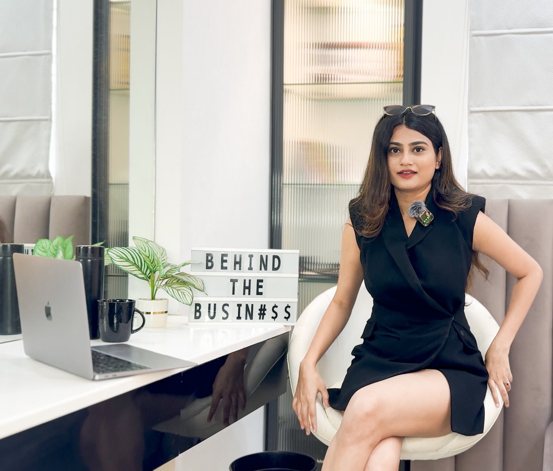 an abstract photo of a curved building with a blue sky in the background