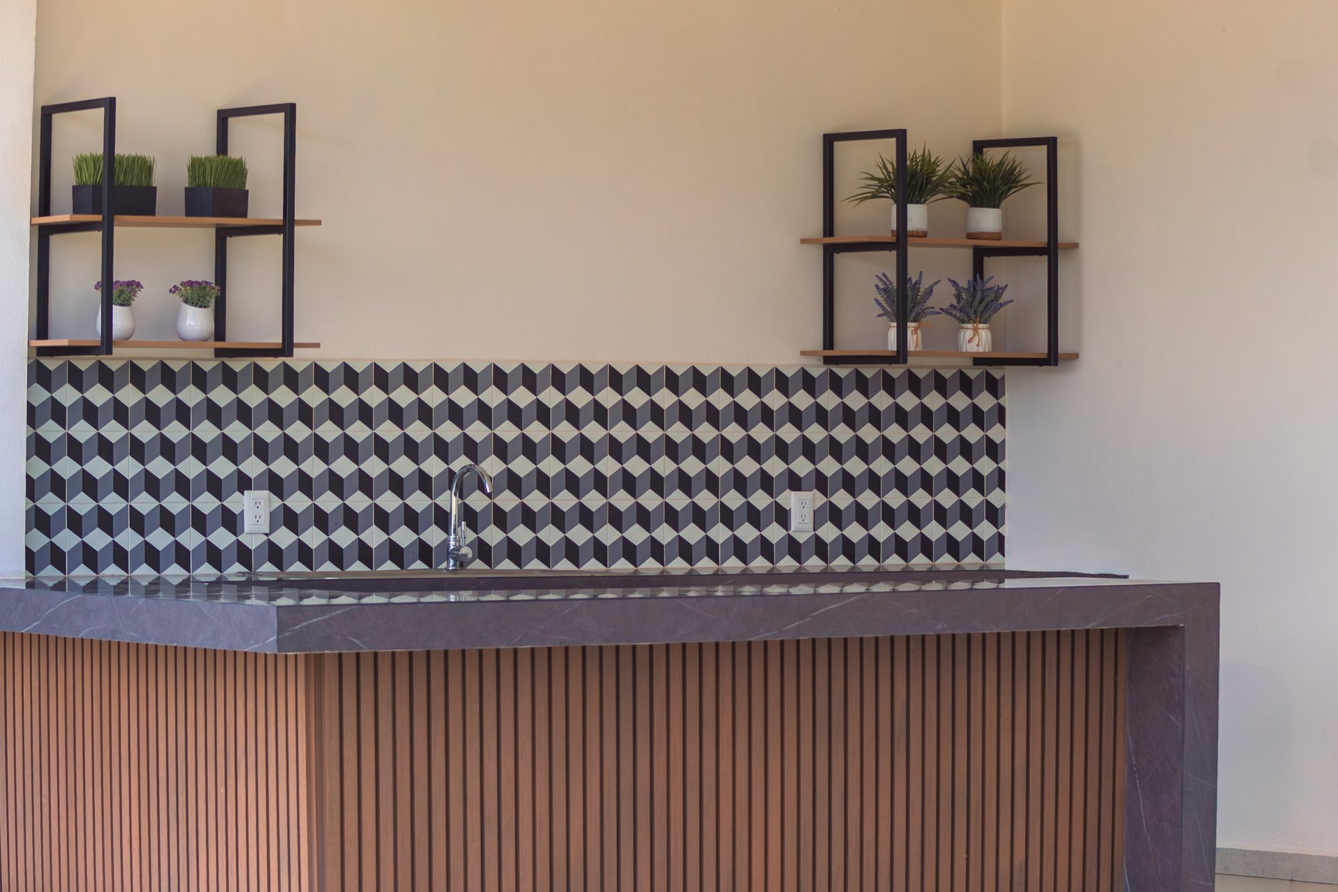 white concrete house near green tree during daytime