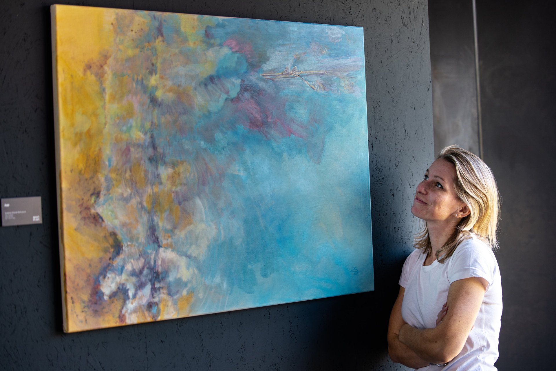 woman holding dried flower