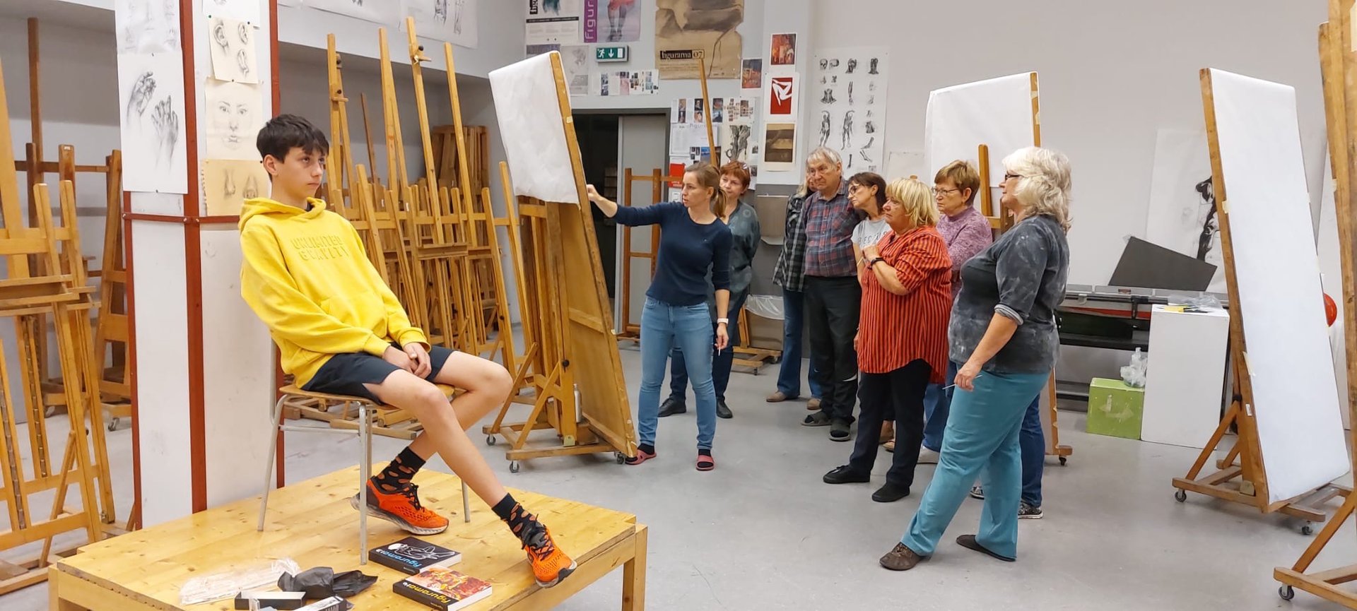 woman wearing yellow long-sleeved dress under white clouds and blue sky during daytime