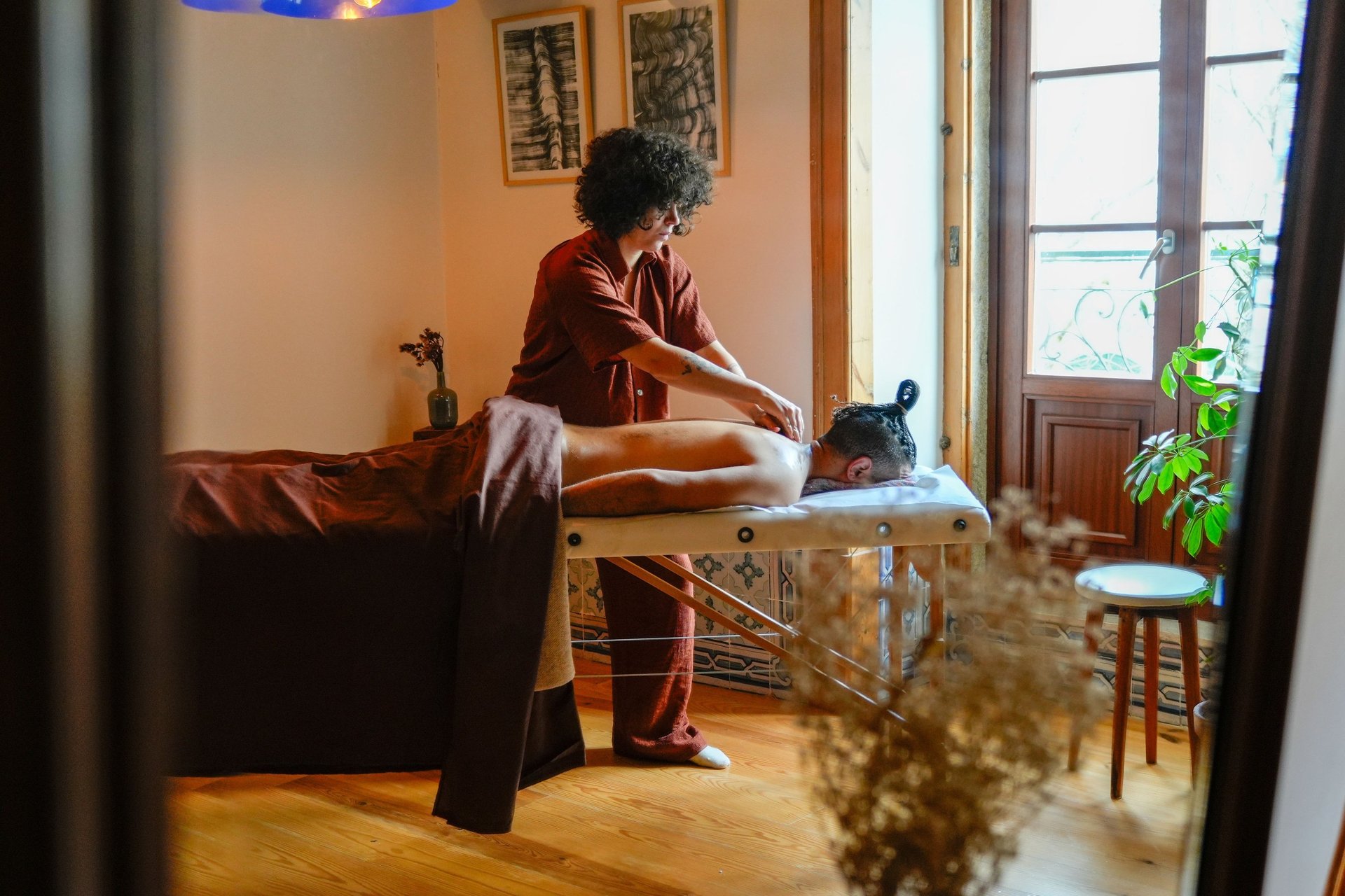 black and brown leather padded tub sofa