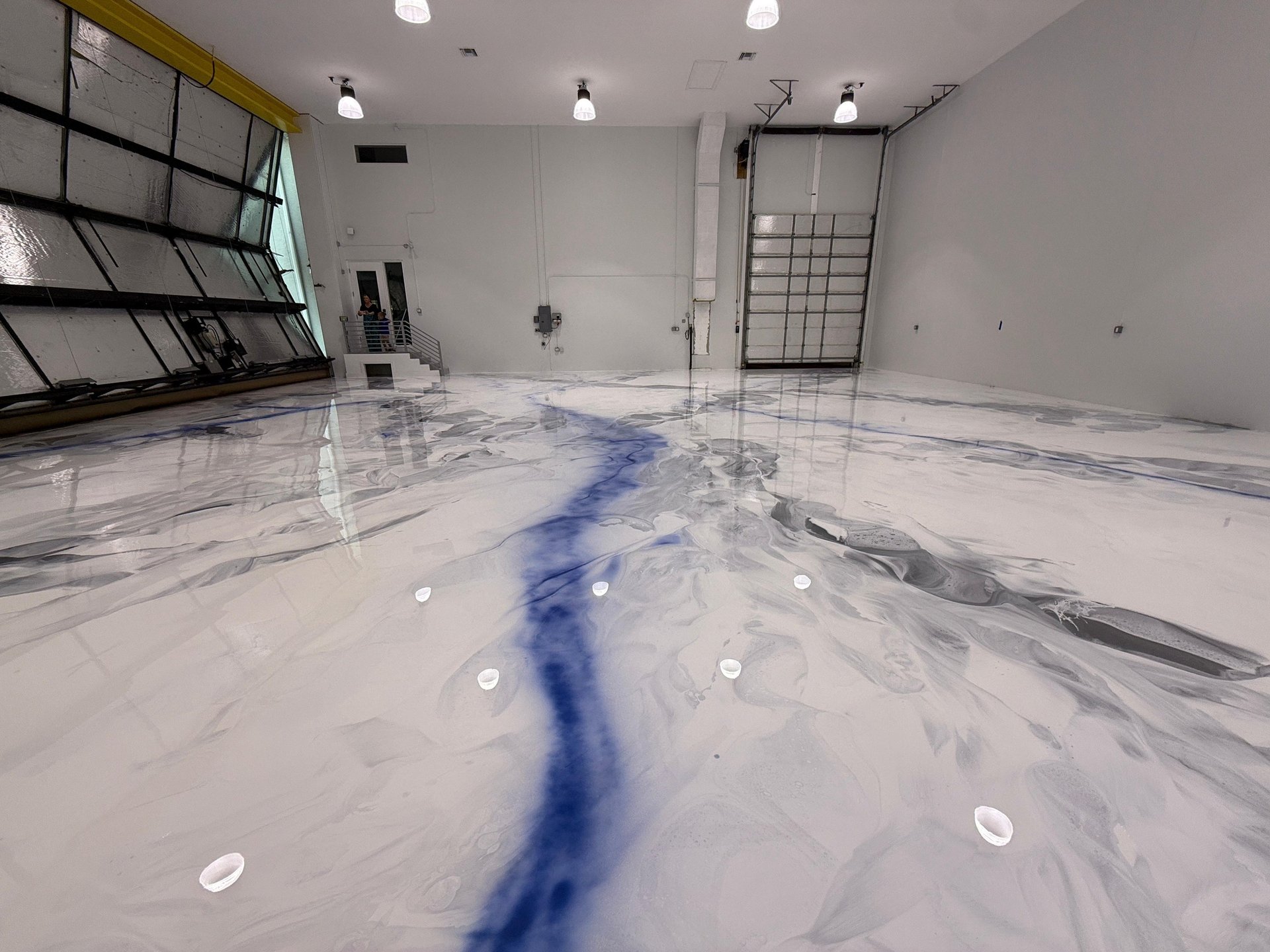 woman wearing yellow long-sleeved dress under white clouds and blue sky during daytime