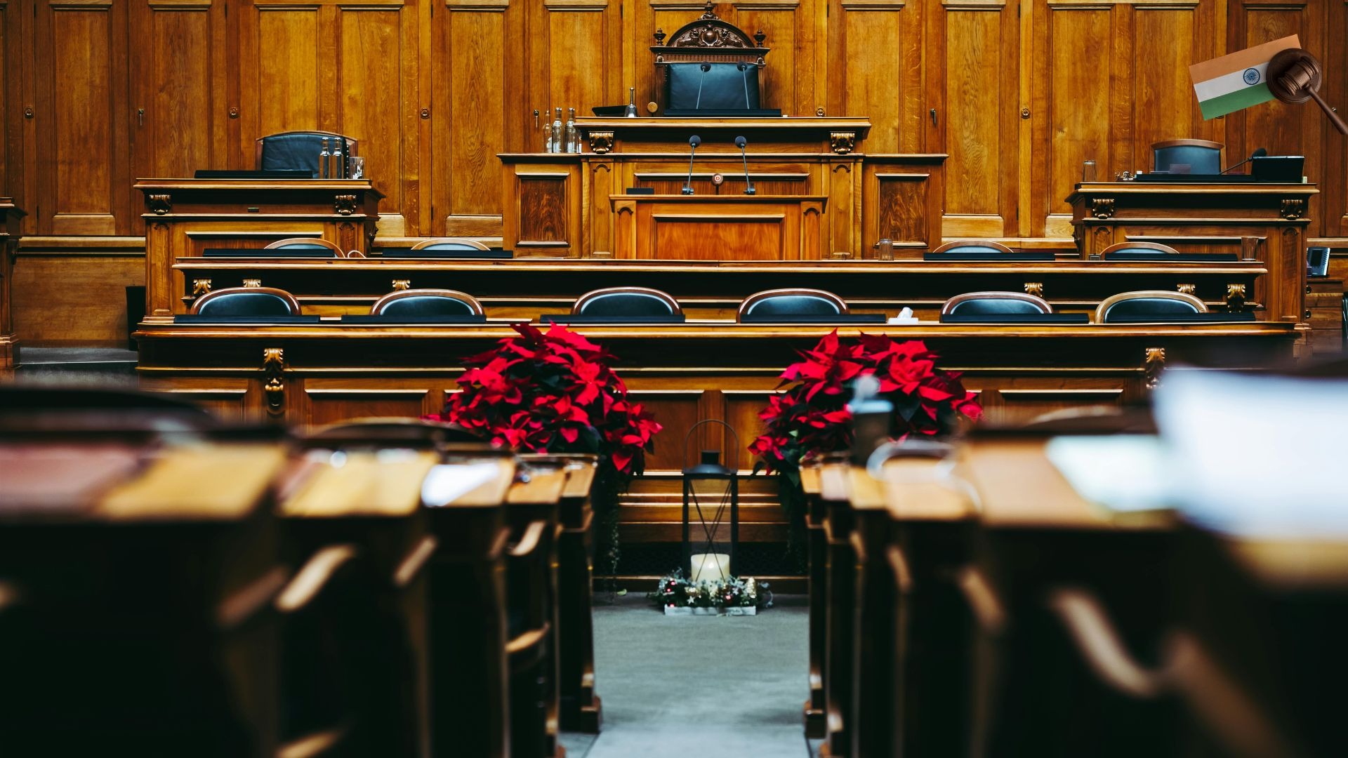 a courtroom with a large wooden bench