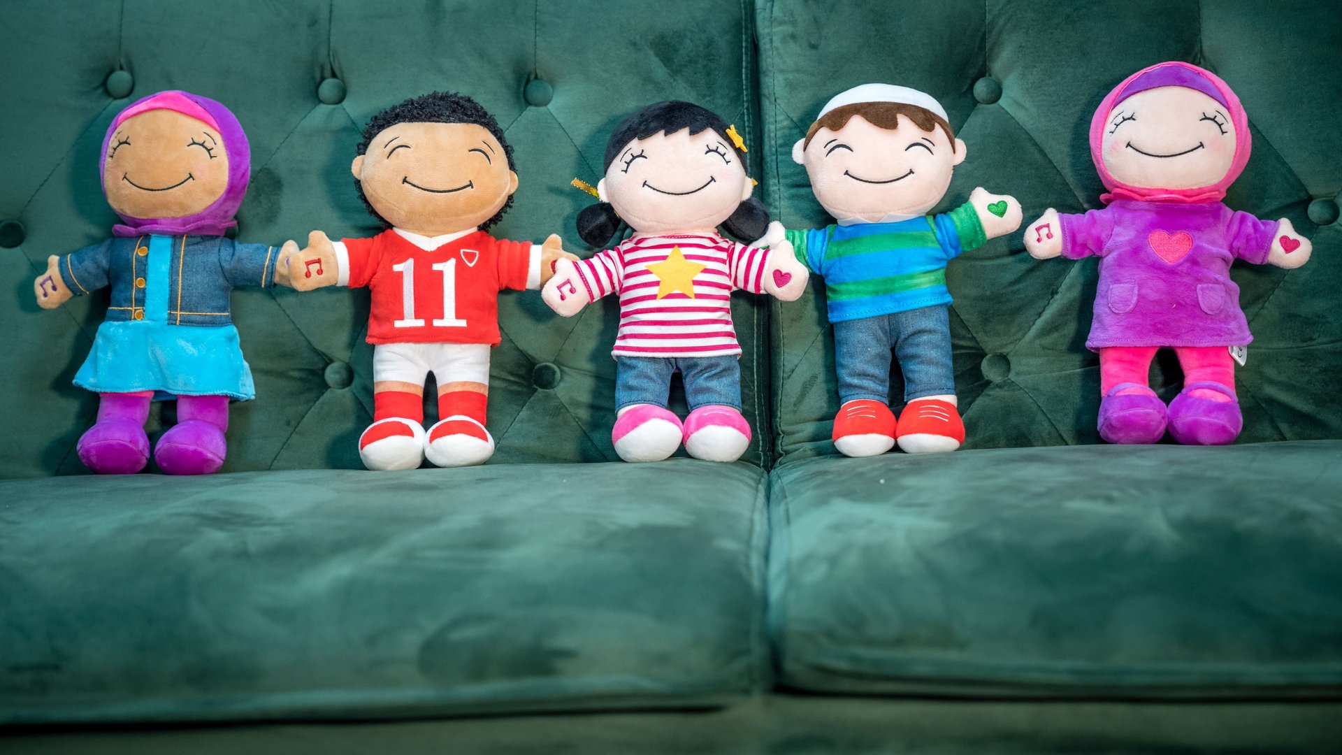 Photo of different Desi Dolls on a sofa