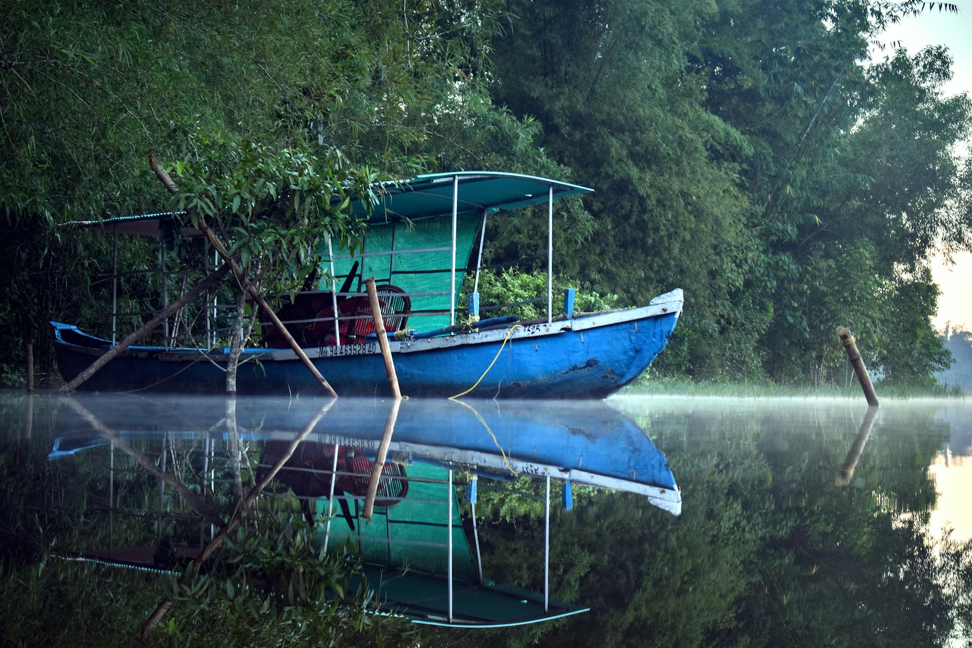 A boat on river at Sasthamcotta, Kerala, India