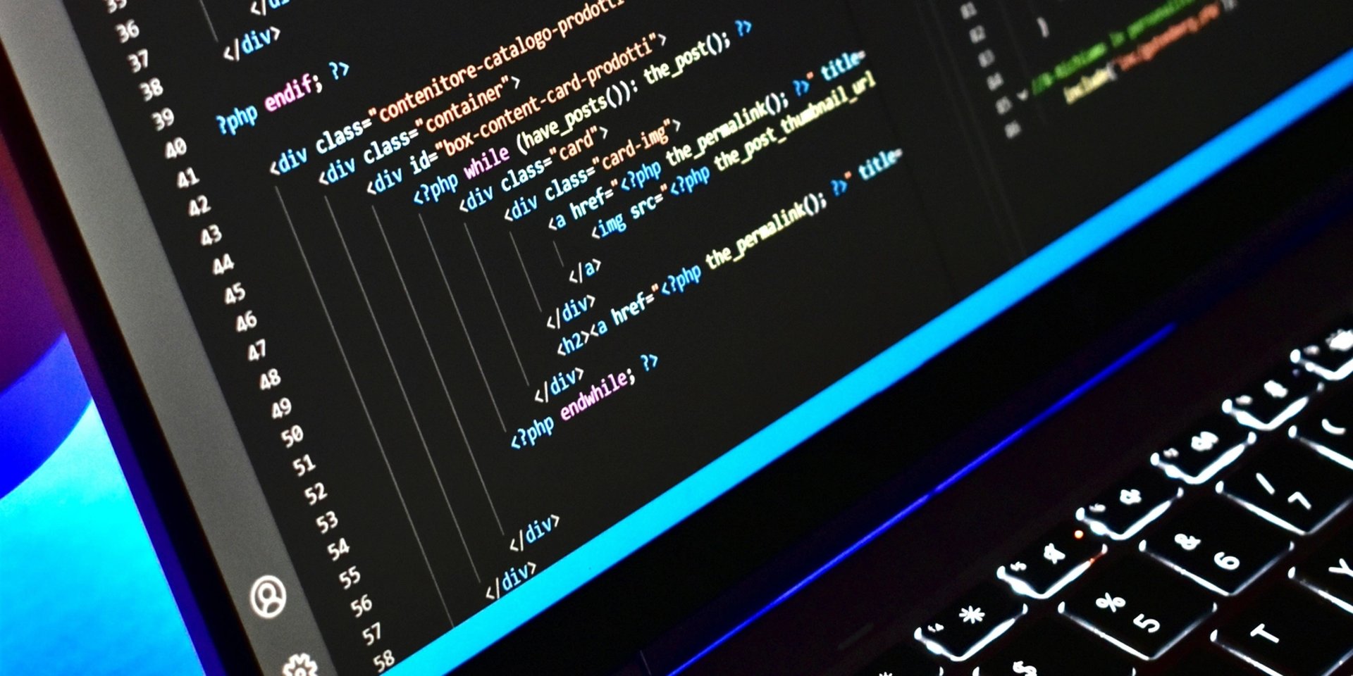 laptop with lines of code