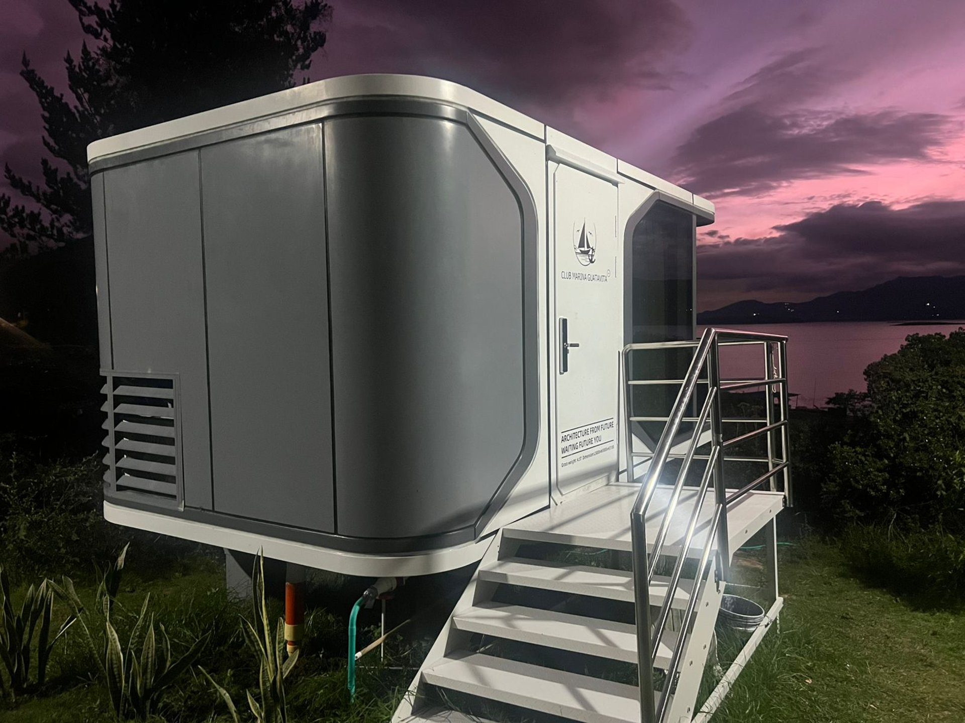 a couple of boats floating on top of a lake