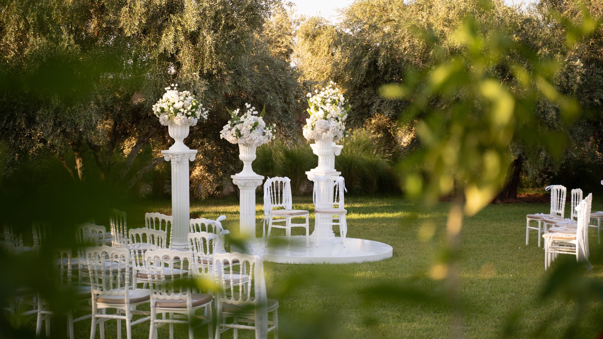 gold wedding band on white textile