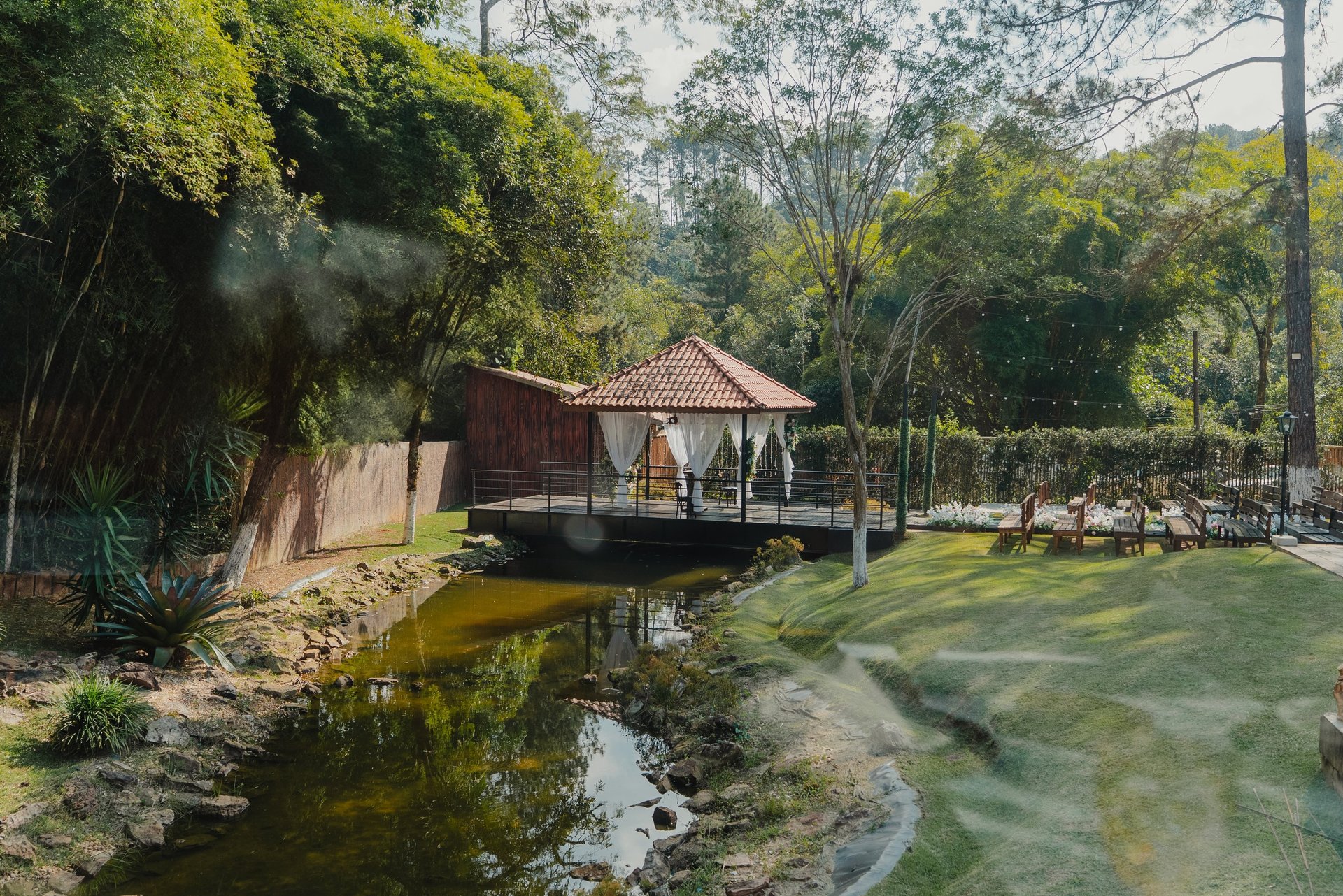 an abstract photo of a curved building with a blue sky in the background