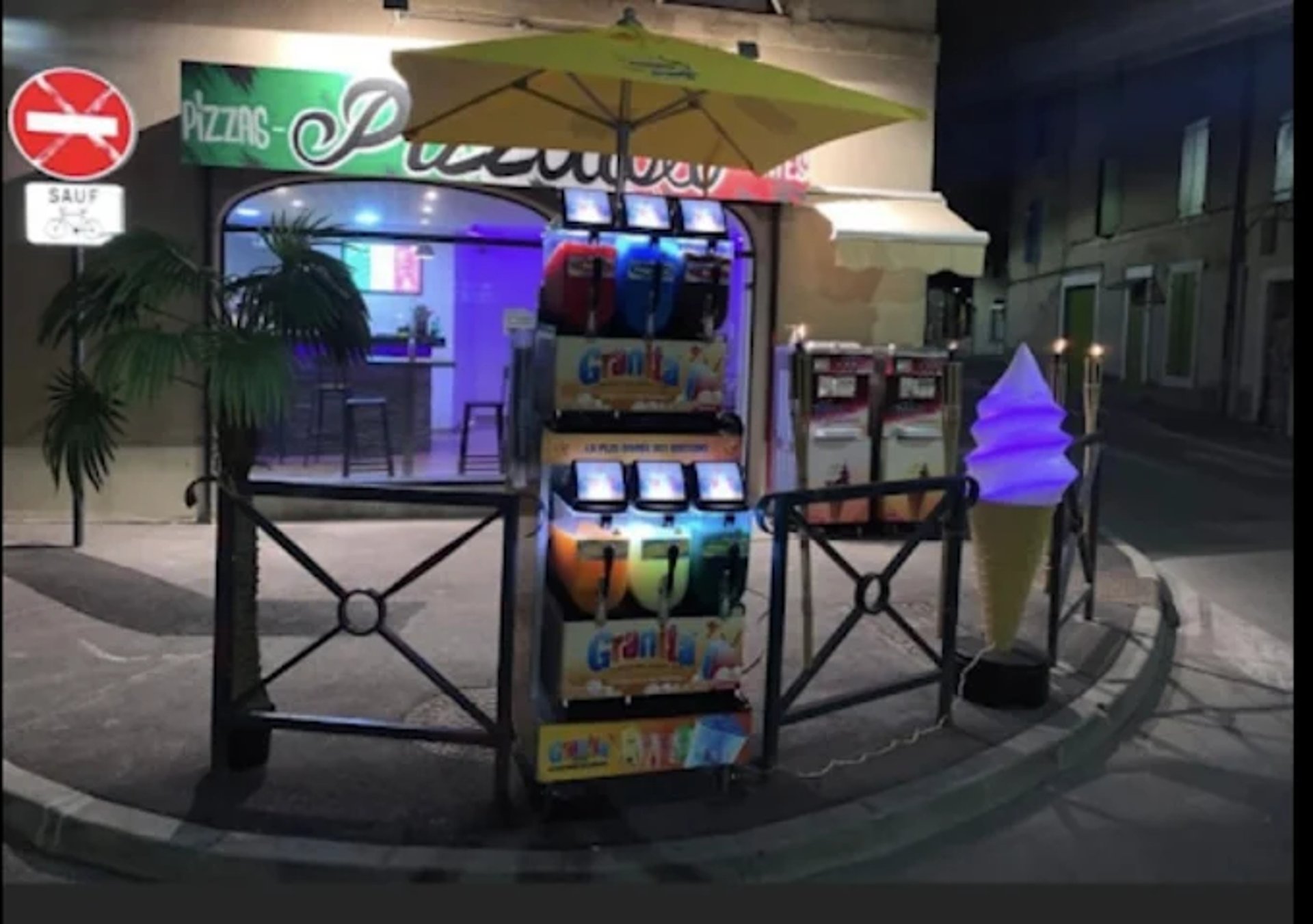 a pizza oven with a pizza inside of it