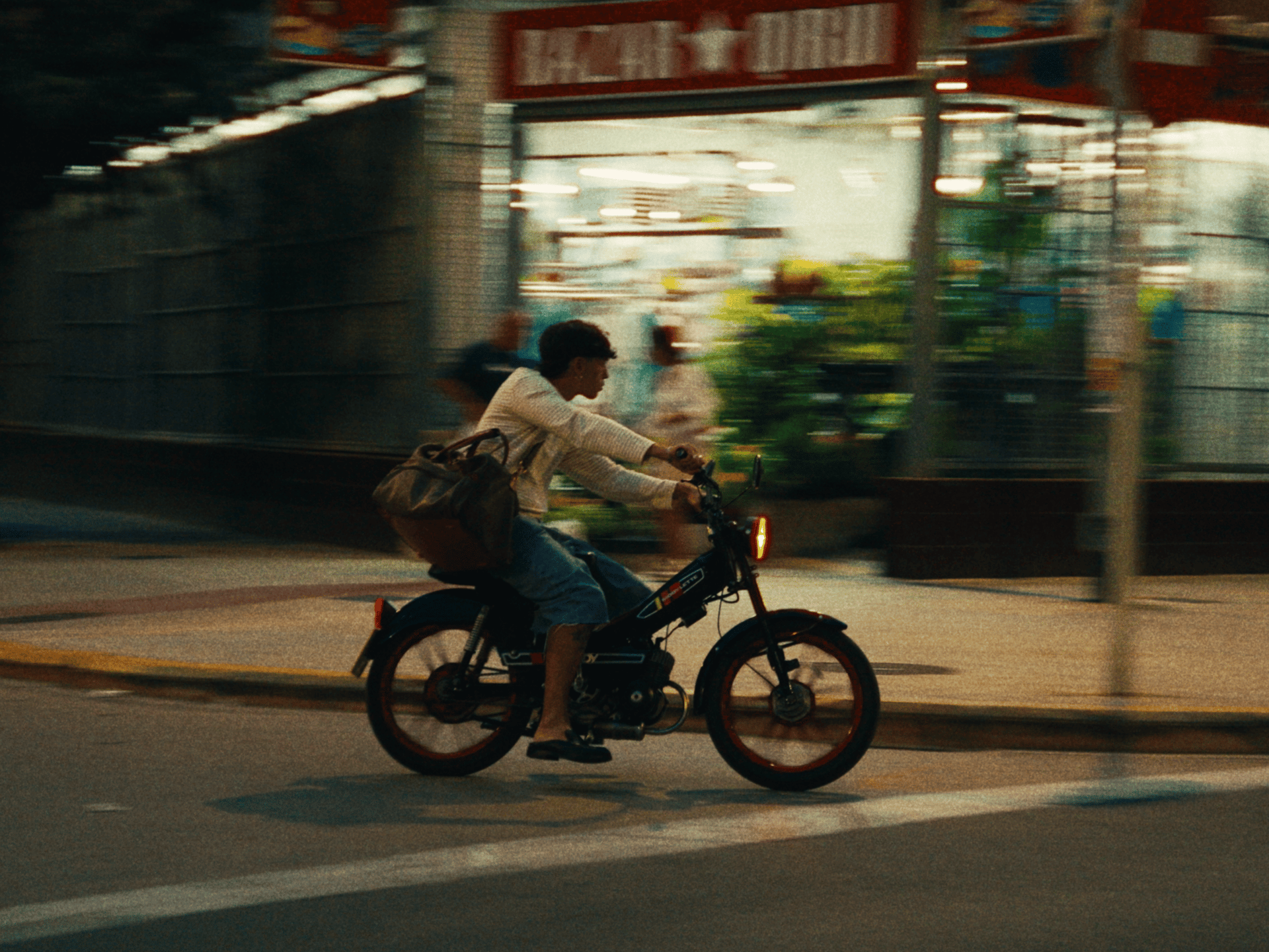 an abstract photo of a curved building with a blue sky in the background