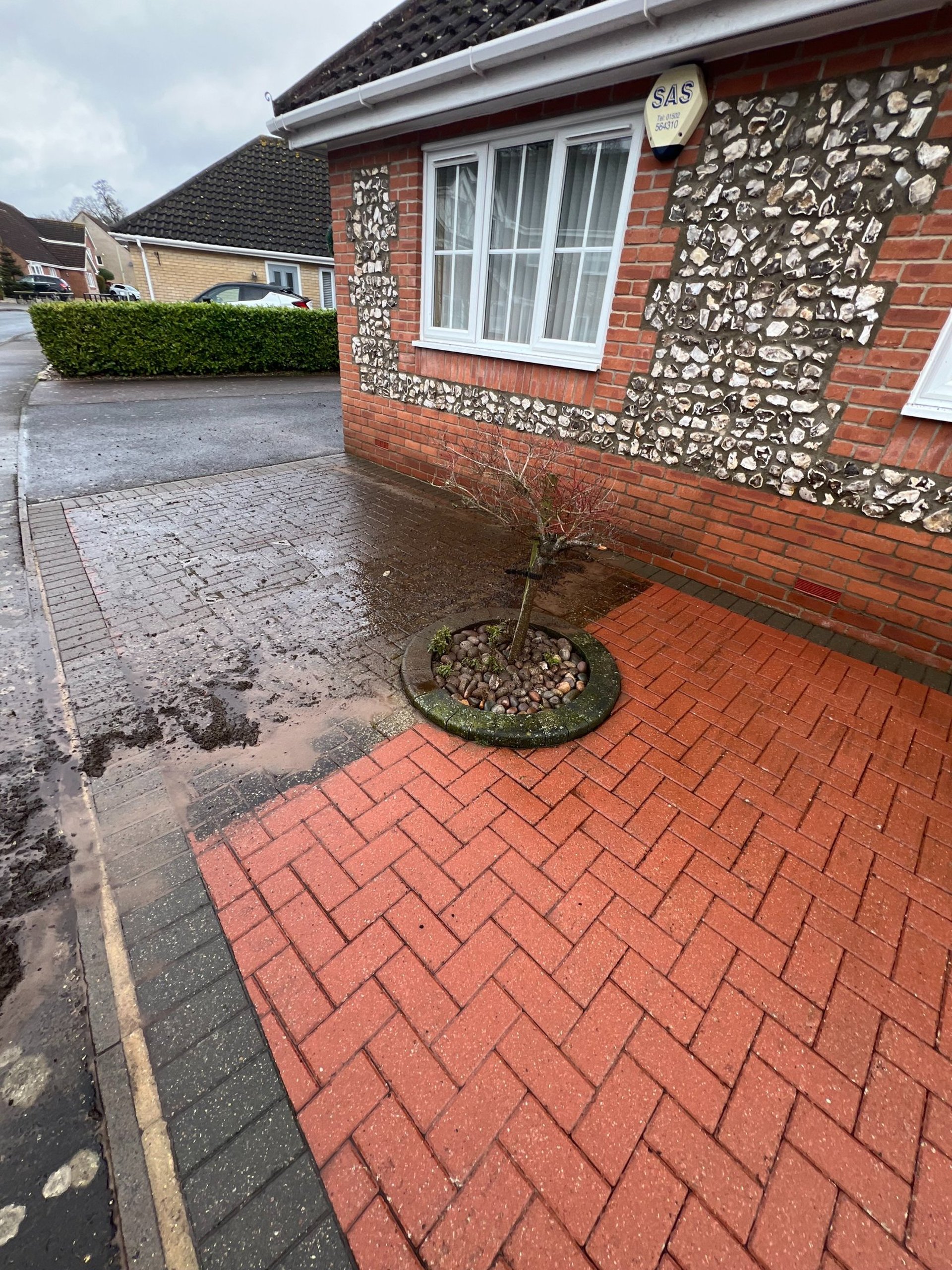 black and brown leather padded tub sofa