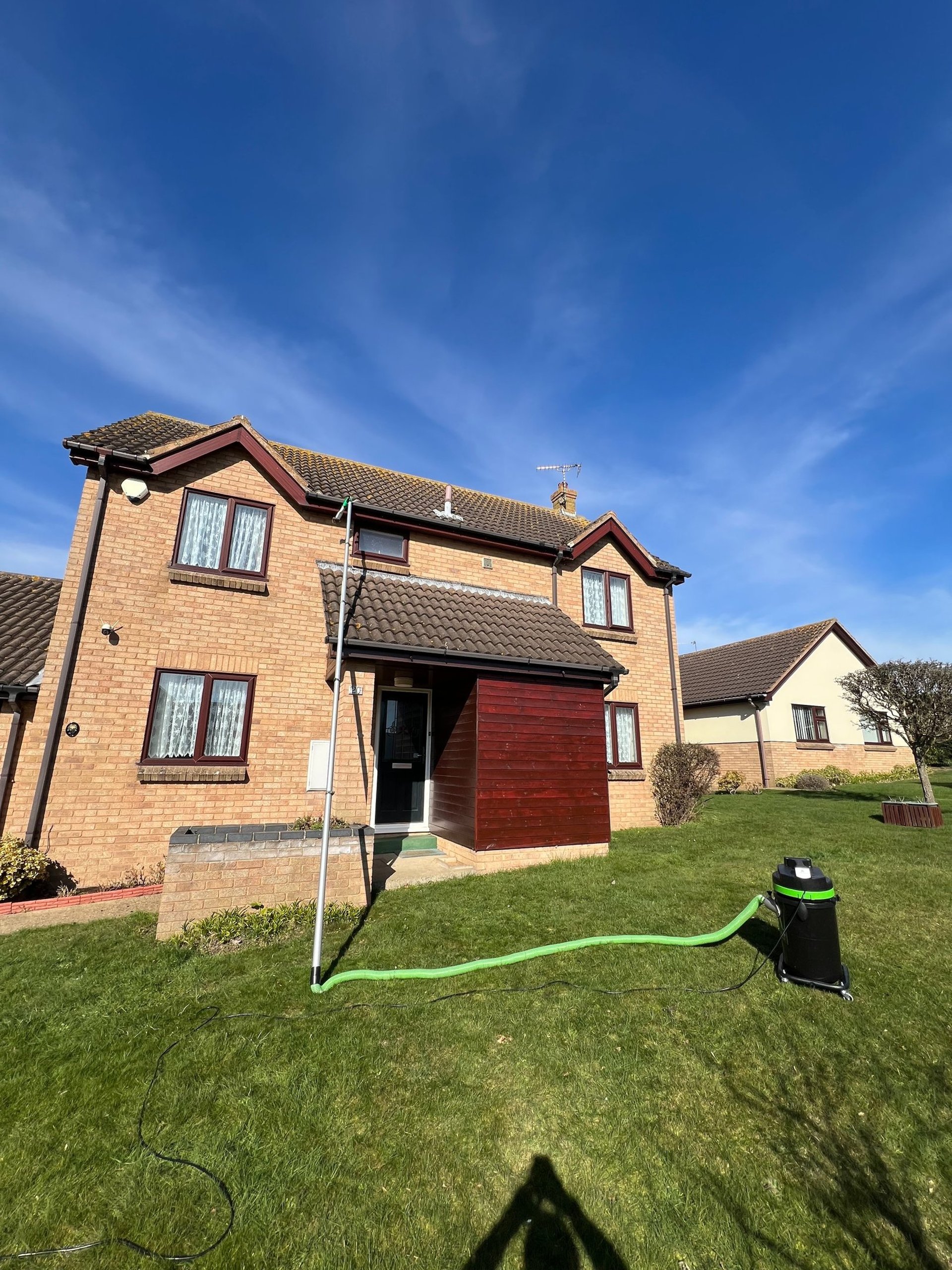 black and brown leather padded tub sofa
